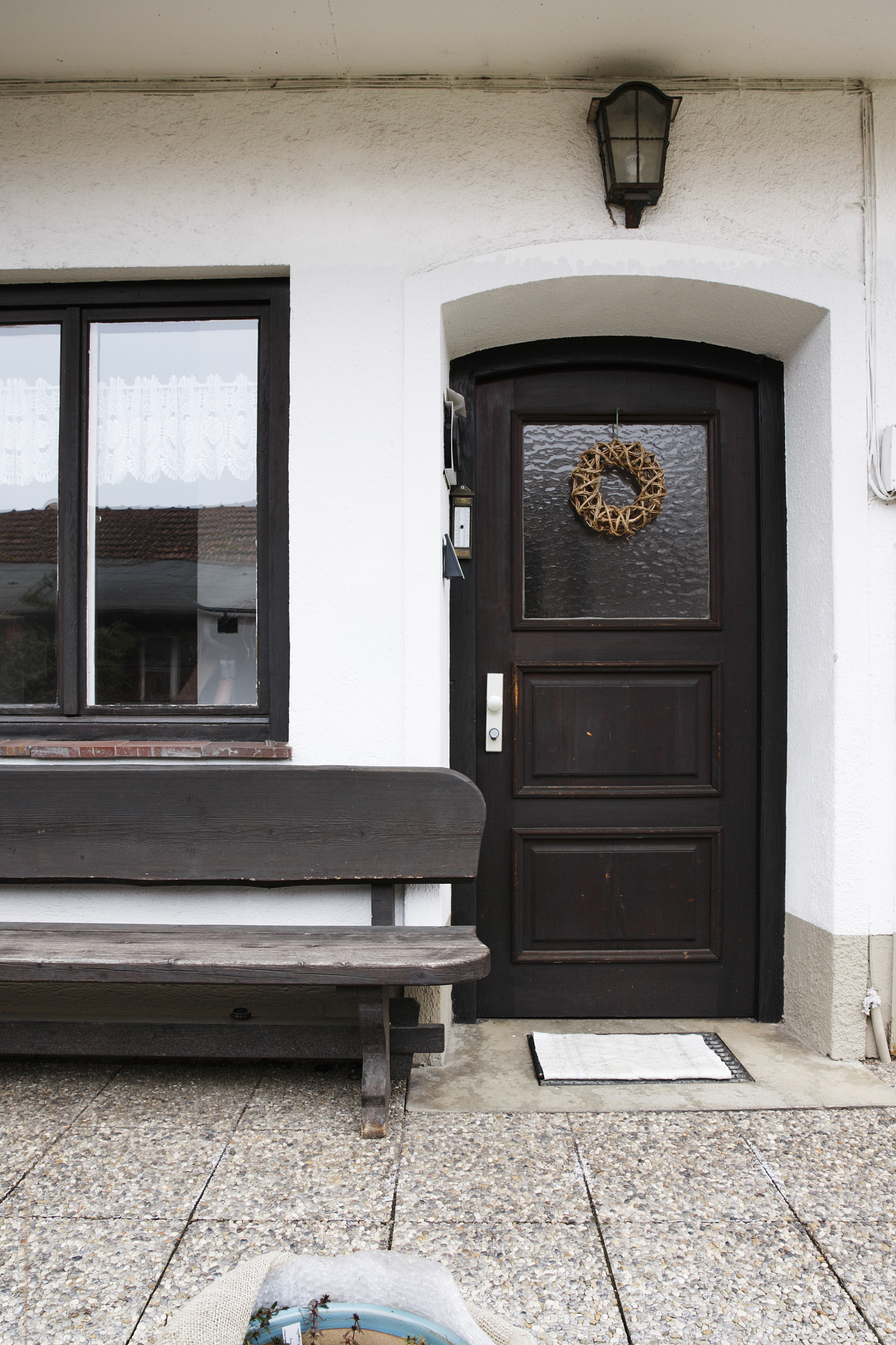 brown front door one third glass window