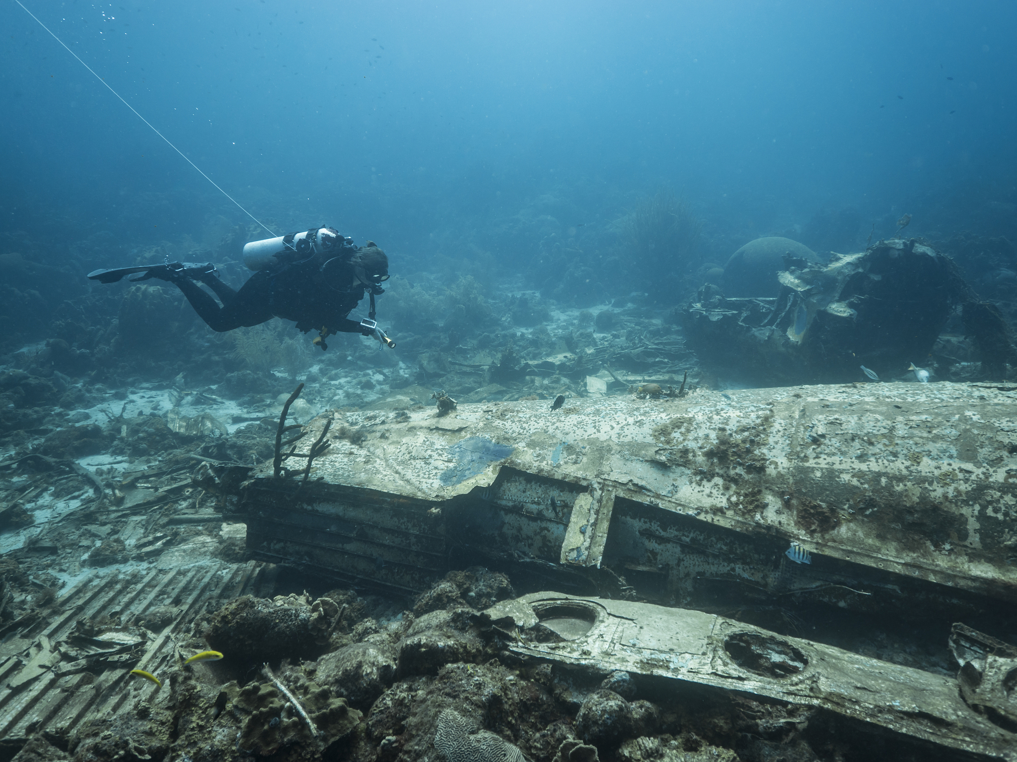 elvin's plane wreck in coral reef of caribbean sea around curaca
