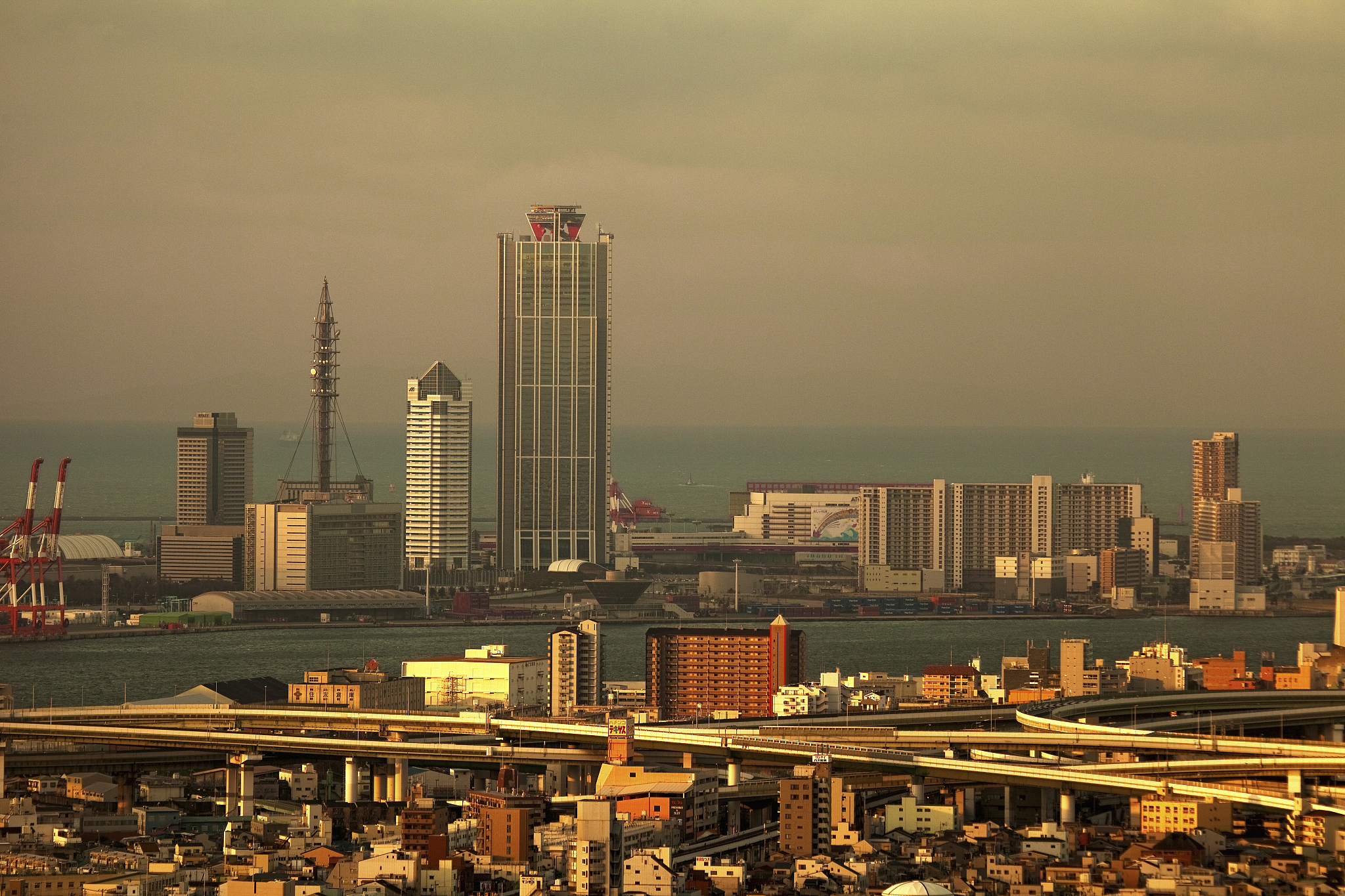 osaka bay area with the sun