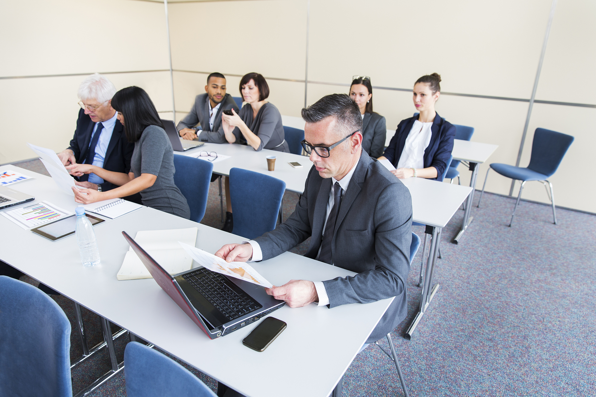 business people in education room working with computers