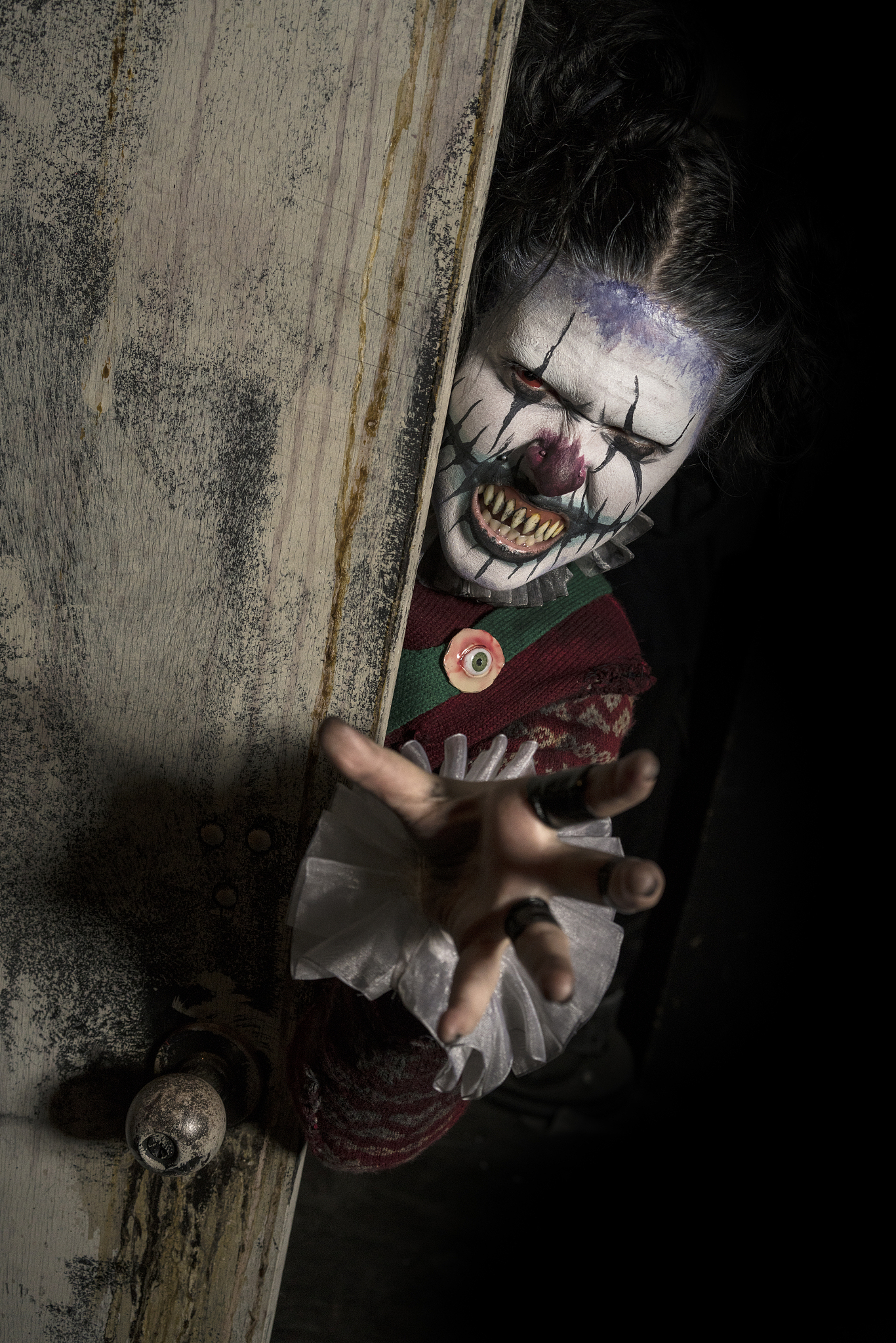 clown behind closet door