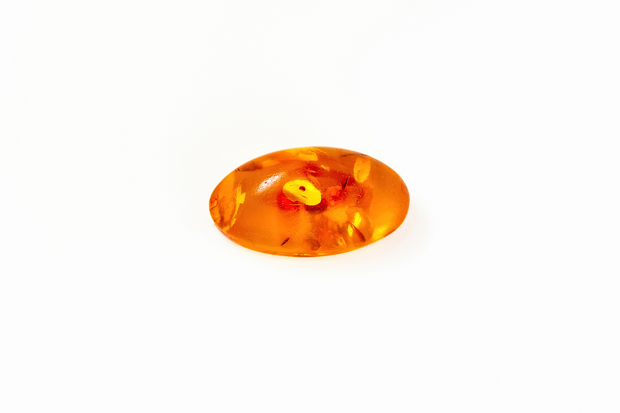 amber stone. mineral amber. rosin yellow amber. sunstone on a be
