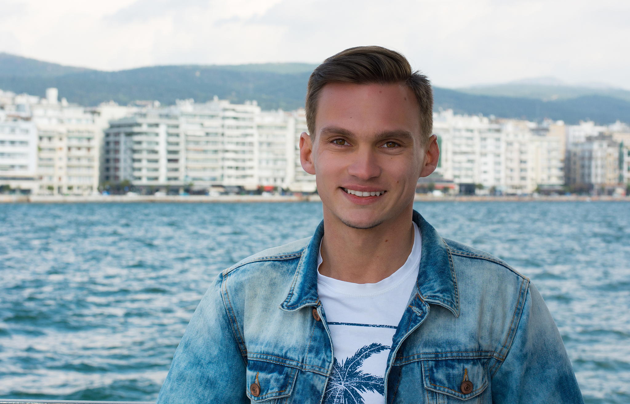 a young handsome man at the seascape