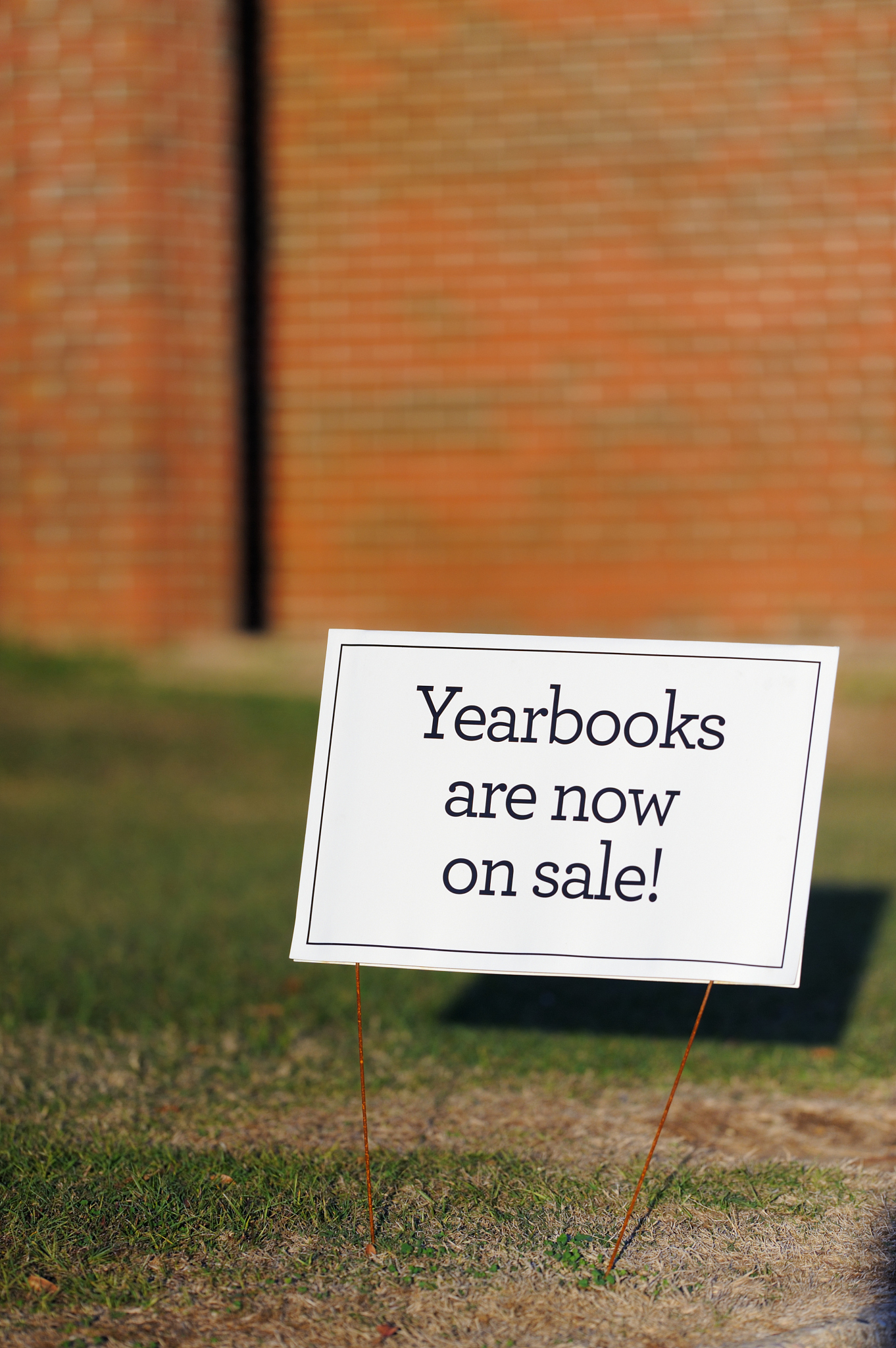 yearbooks are now on sale sign
