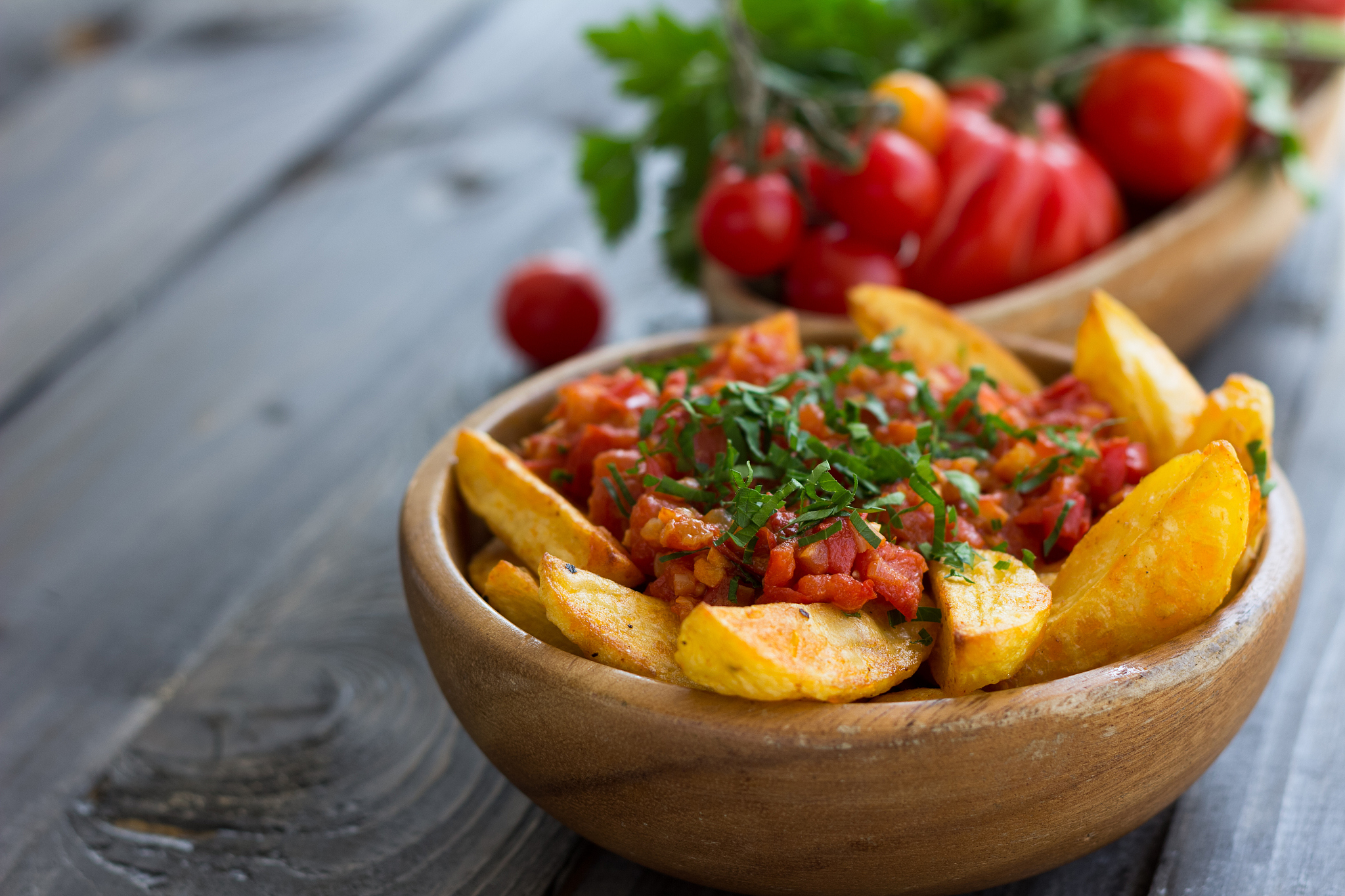 patatas bravas, baked potatoes with spicy tomato sauce