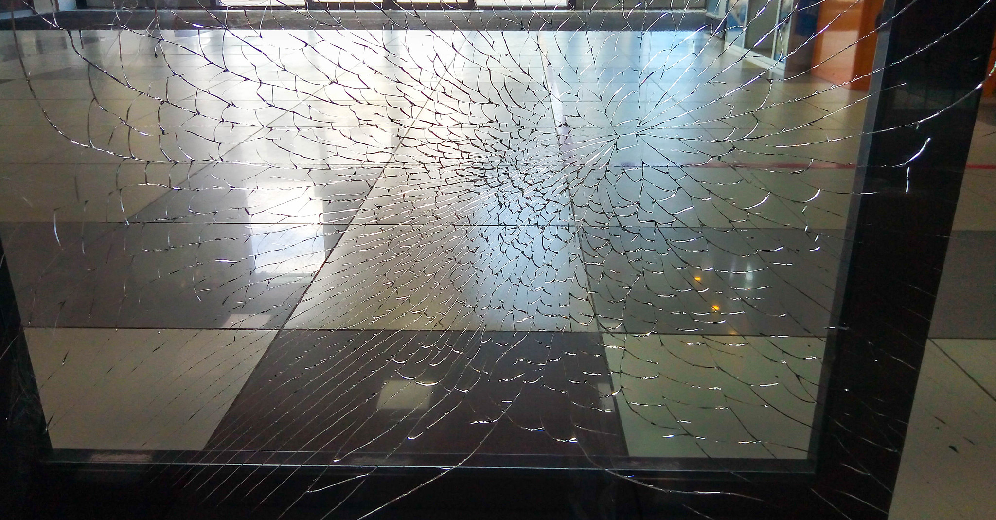 broken glass pane. the broken glass window the shop