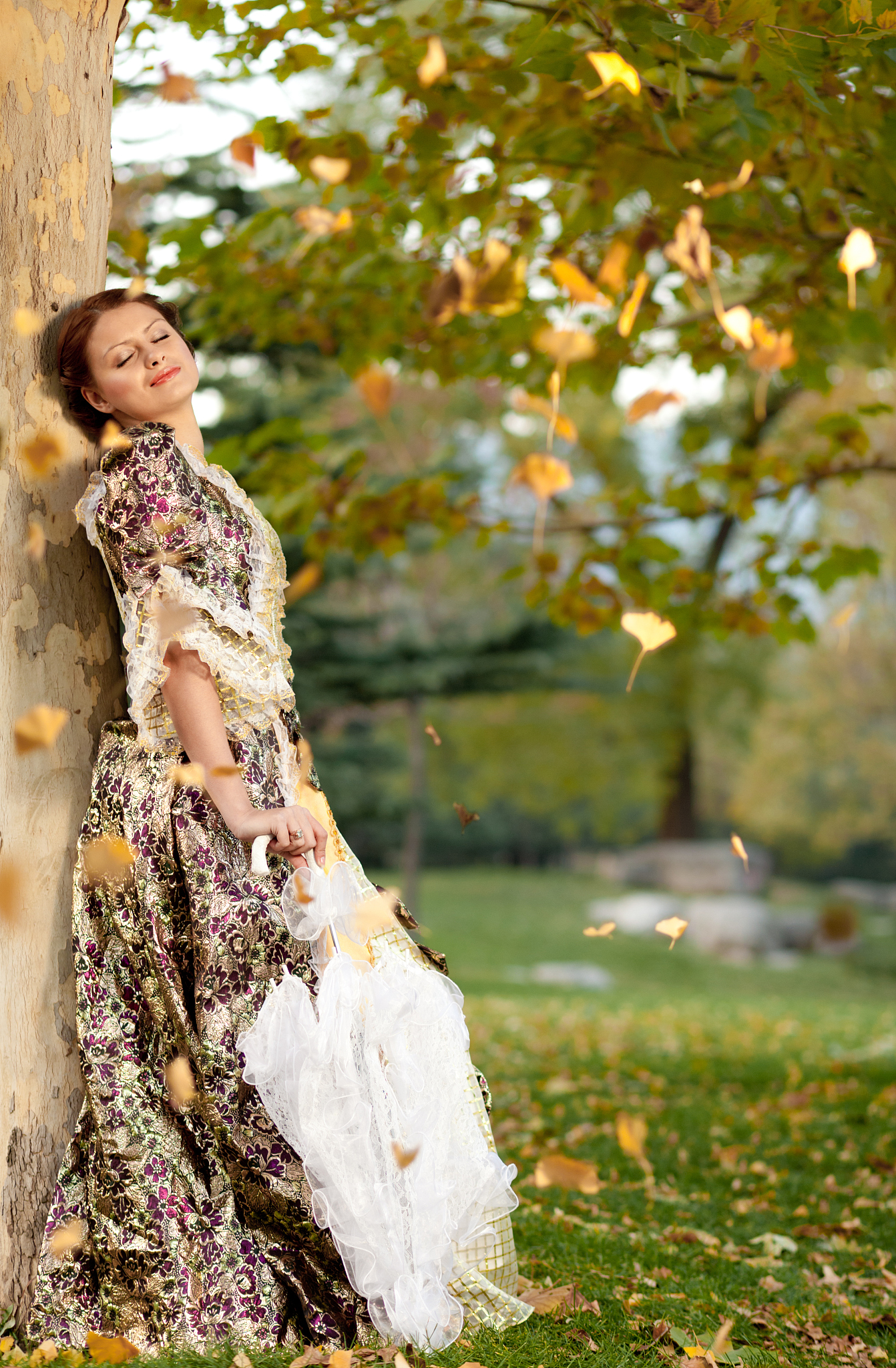 young woman in the rays of autumn sun