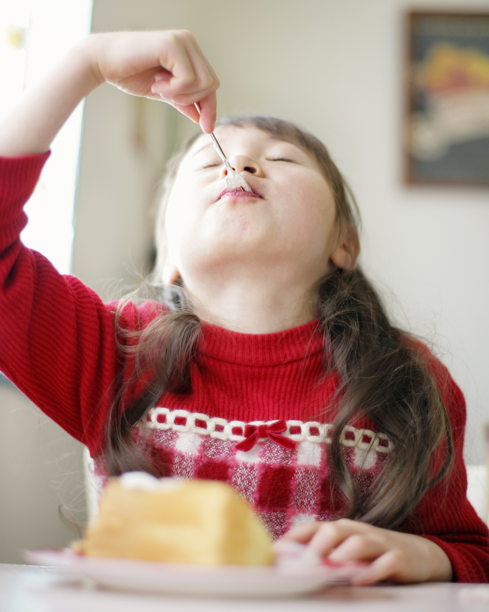 girl eating cake