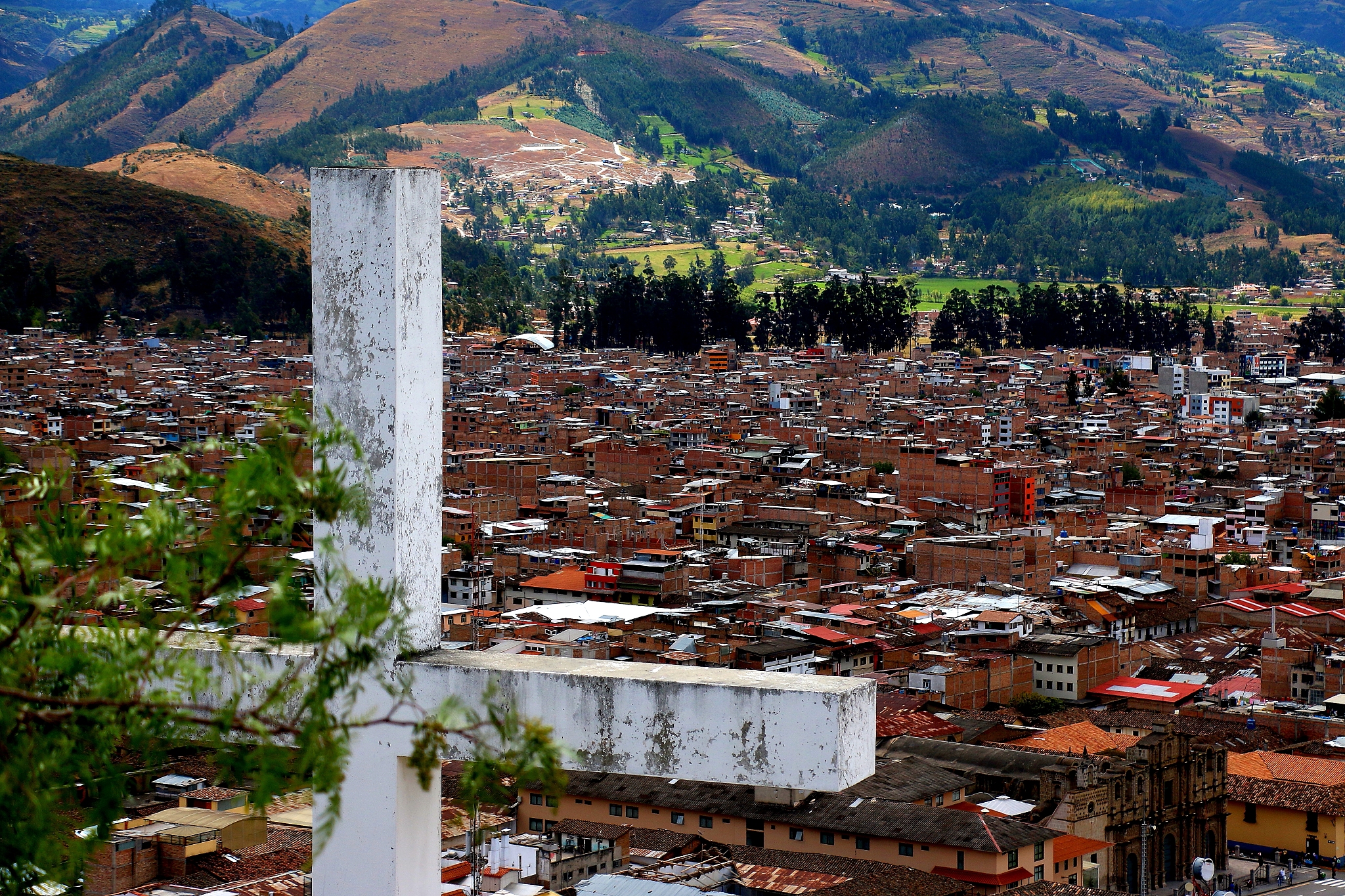 cross looking the city