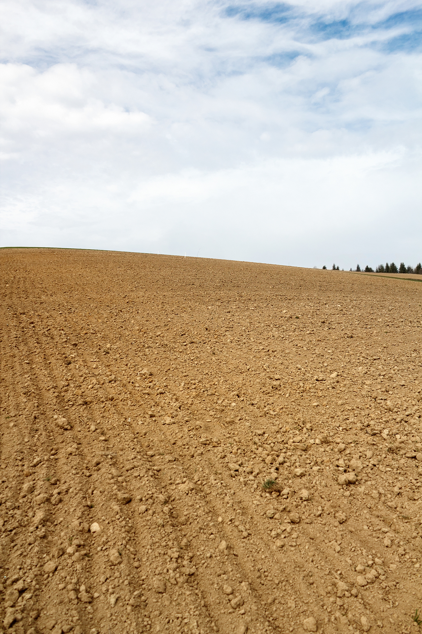 plowed field background. beskids mountains, poland.