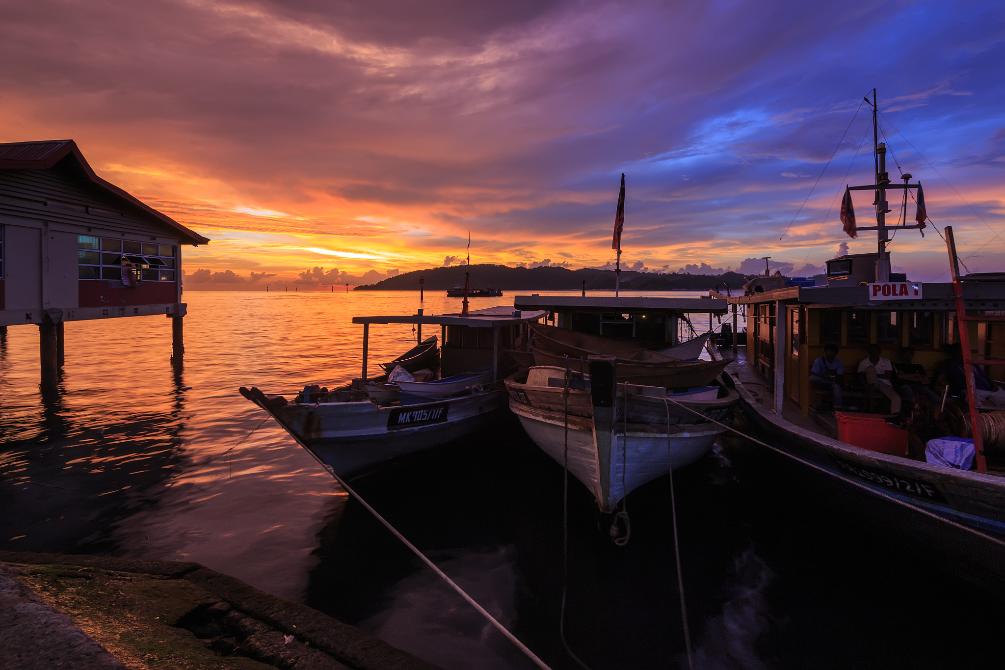 beautiful landscape sunset scene with fisherman boat