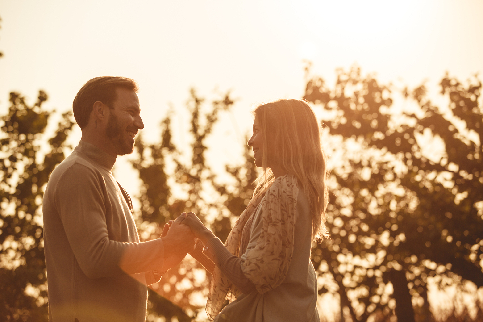 mid adult loving couple outdoors