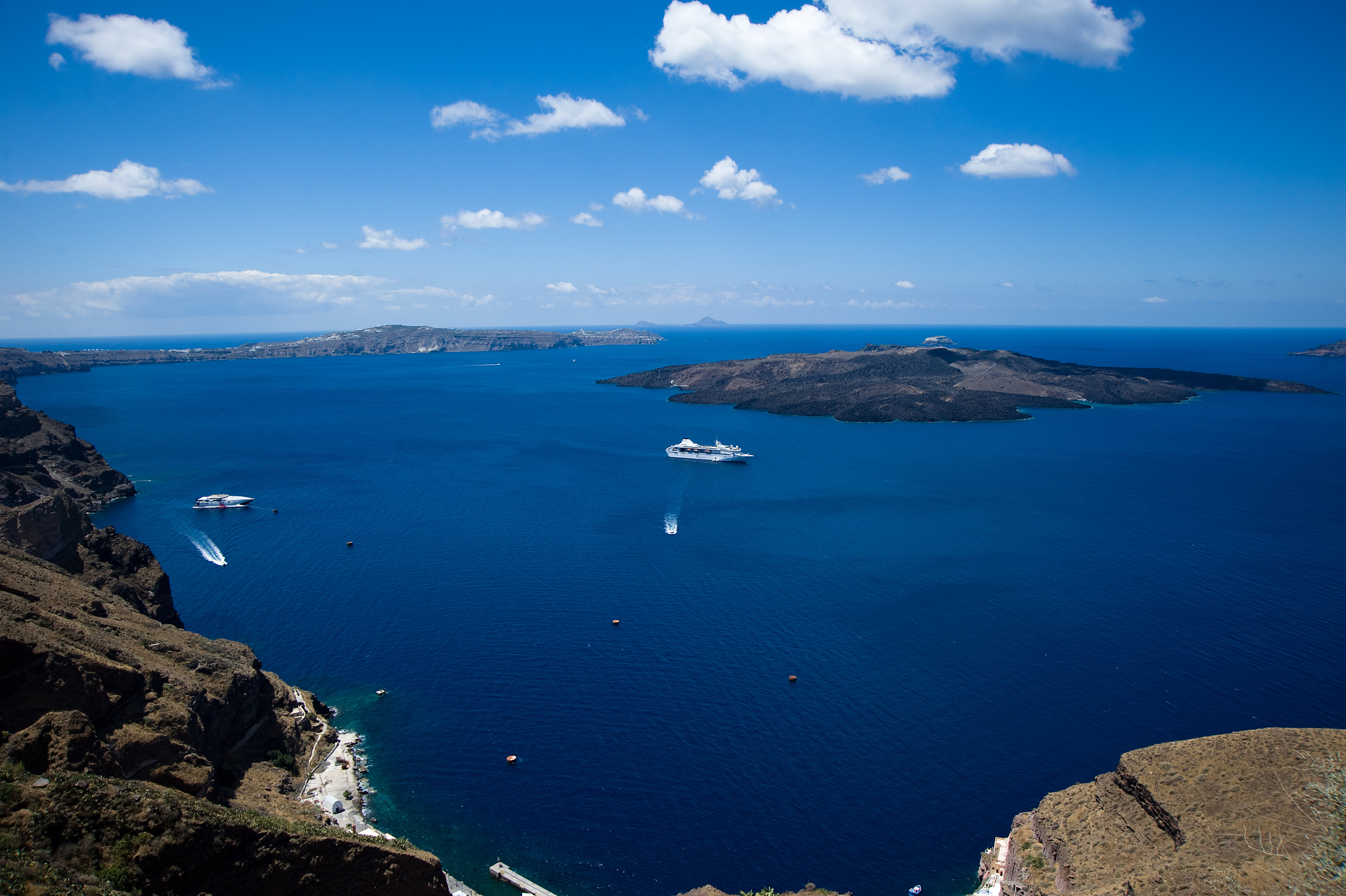 yacht underway out at aegean sea of santorini,greece
