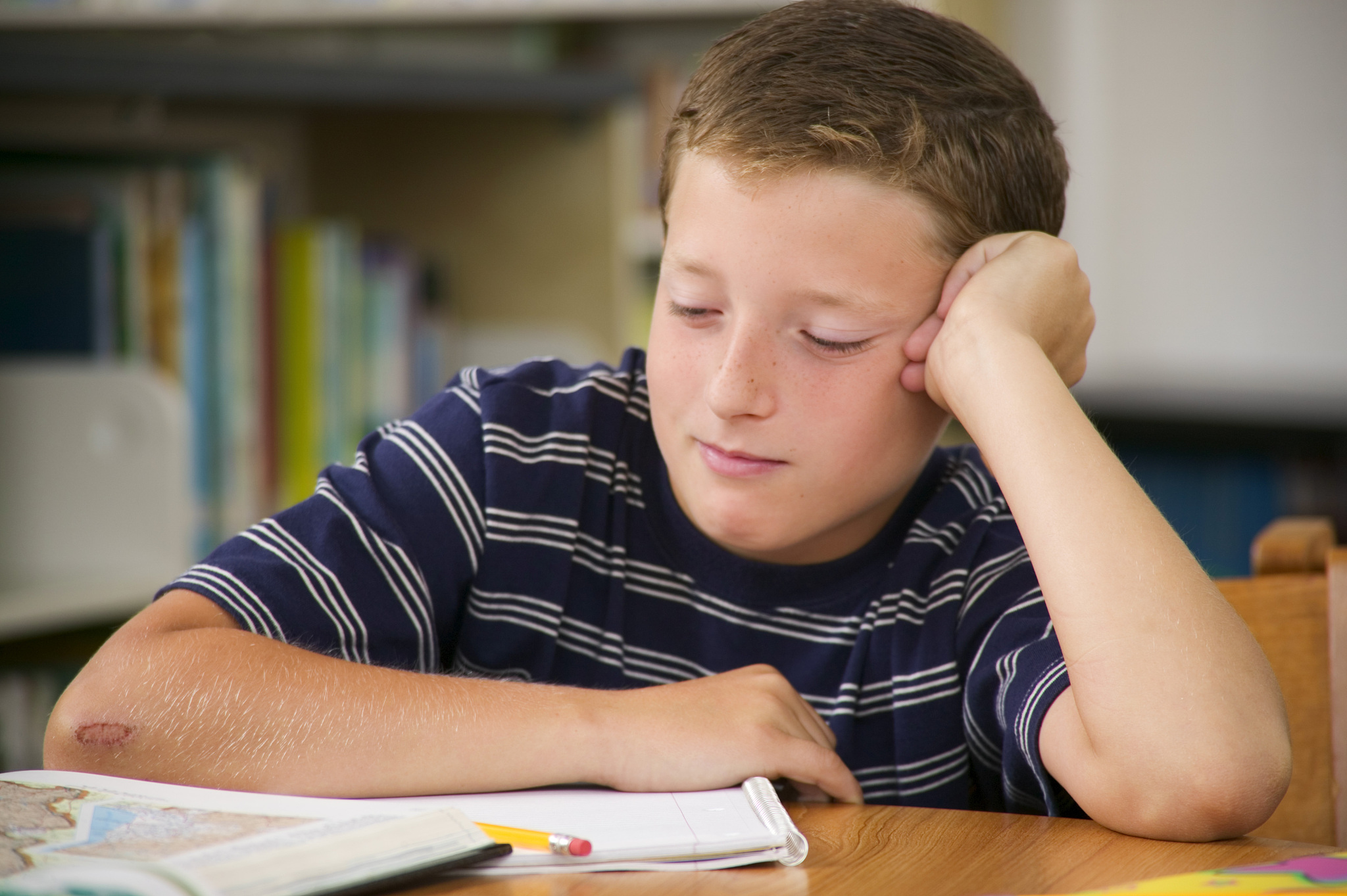 student sitting down reading