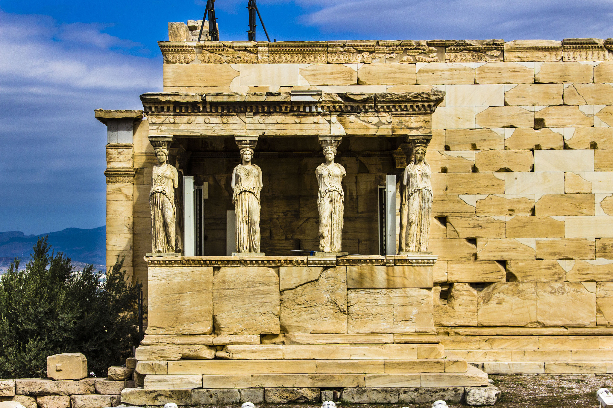 the famous caryatids inside the erecteion, acropolis, greece