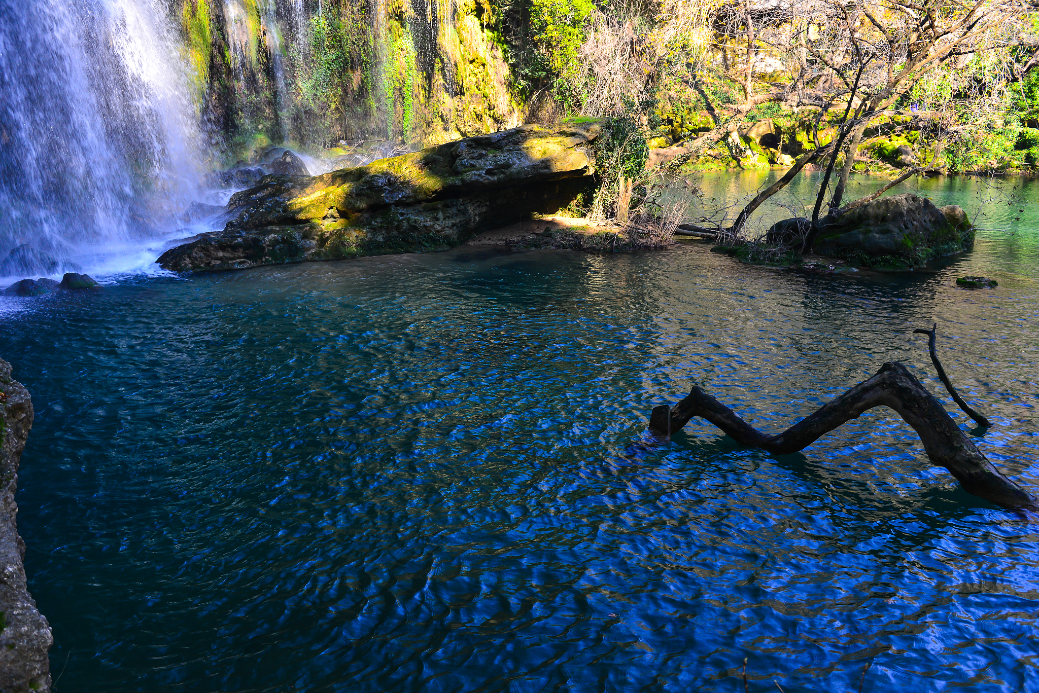 watrefall in the forest between mountains