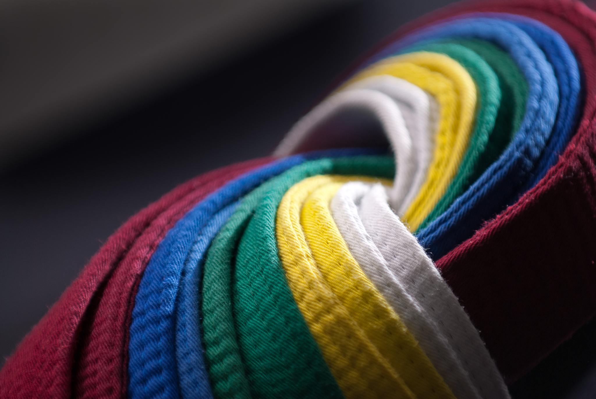 taekwondo belts, dark background