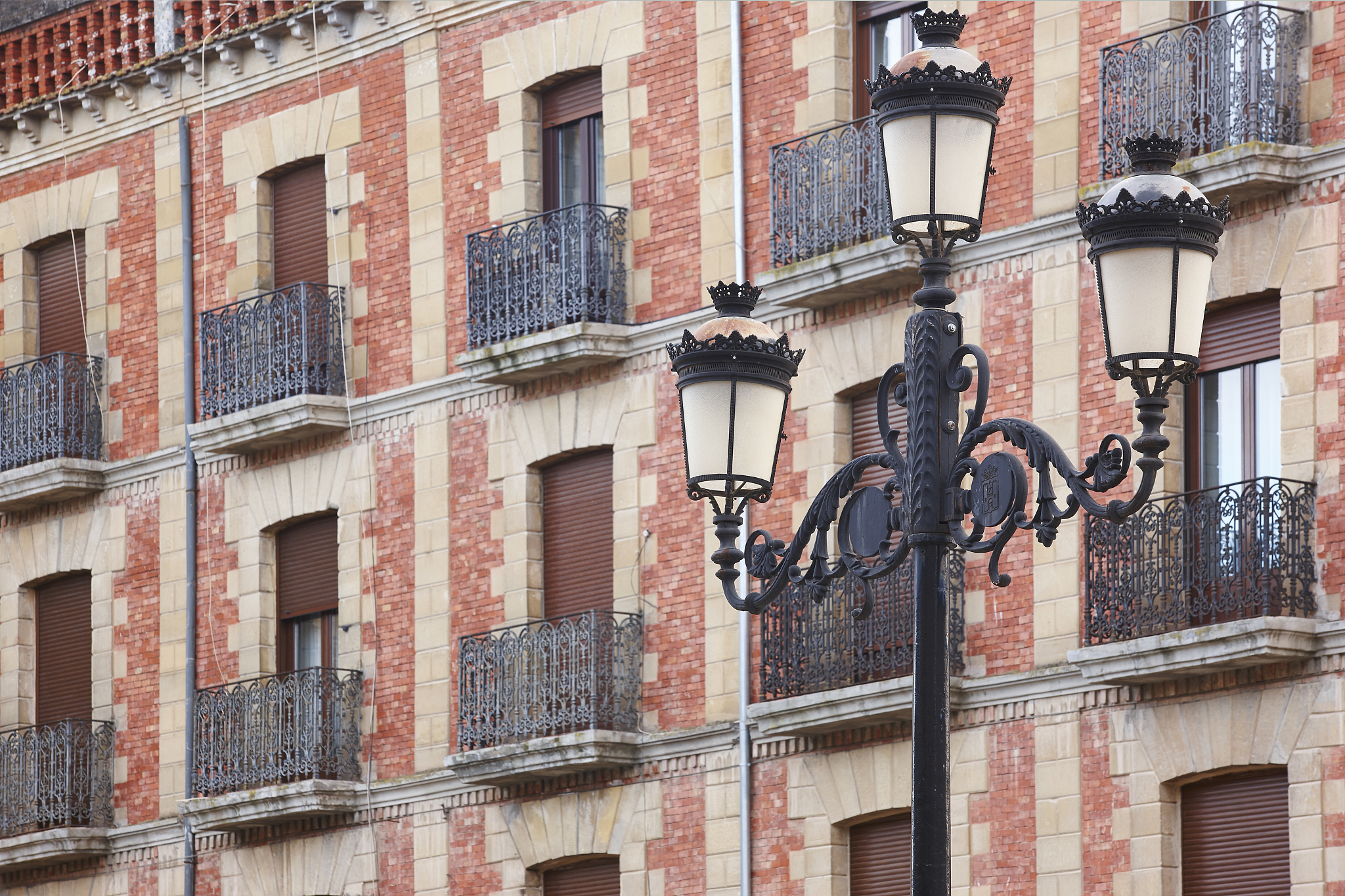 traditional andalusian village facades and lamp in baeza. spain