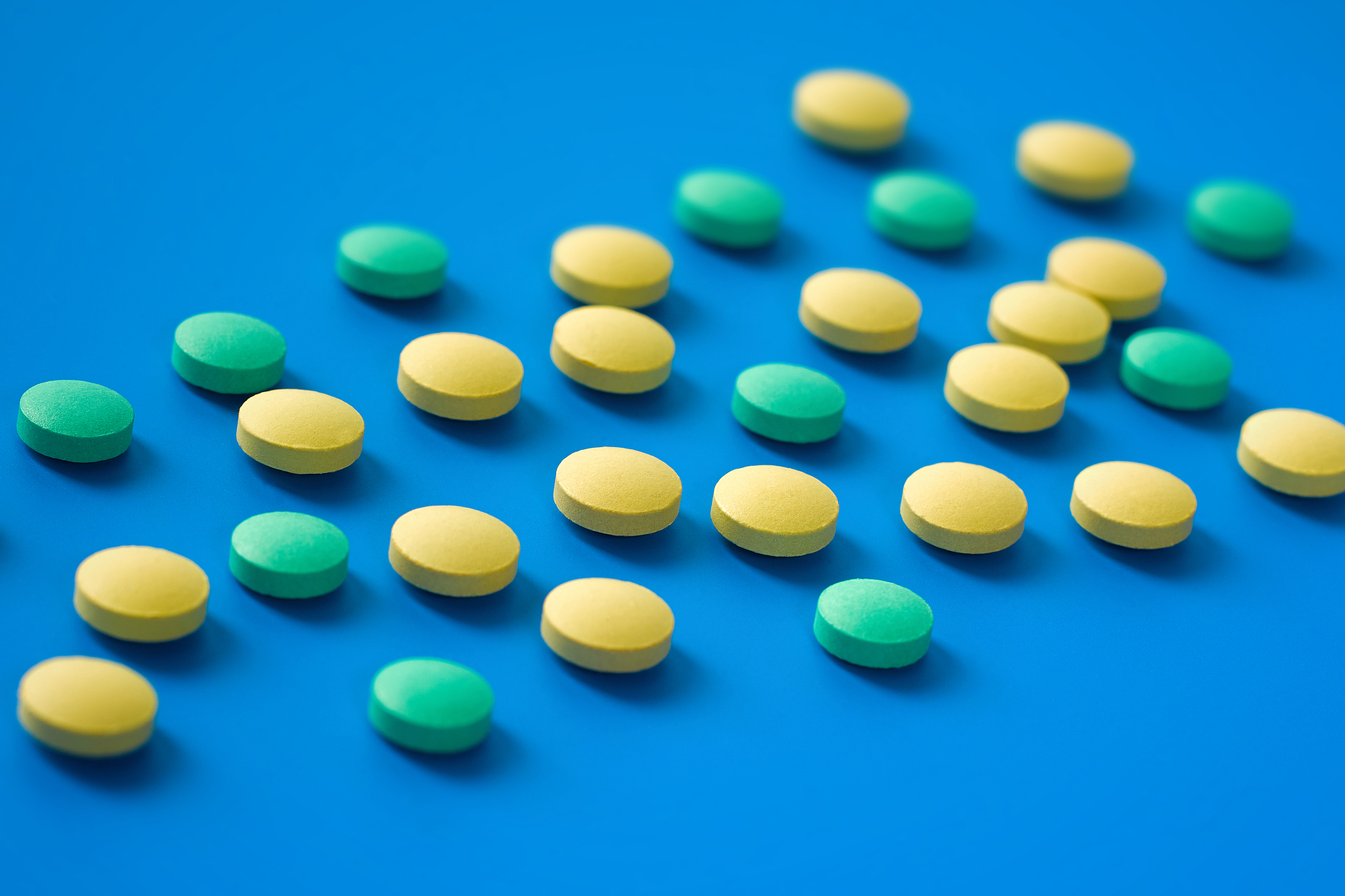 closeup of a lot of round pills