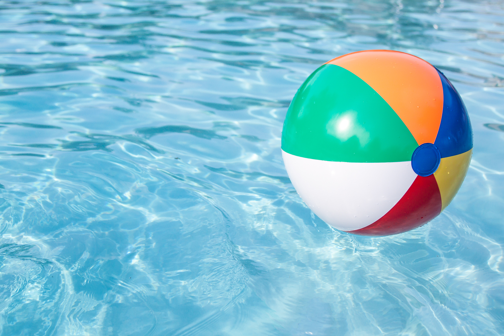 colorful beachball in a pool