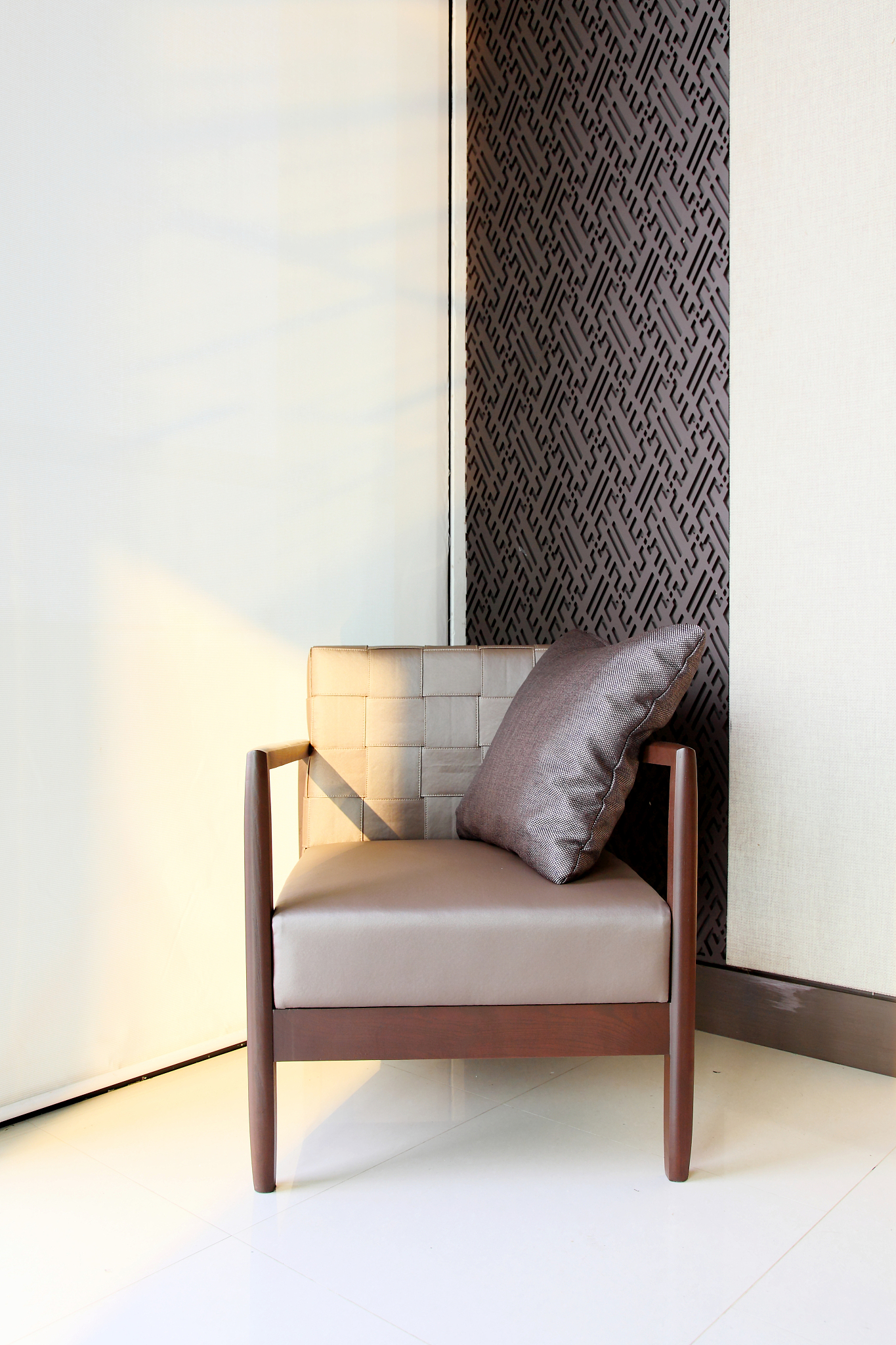 beige upholstered chair