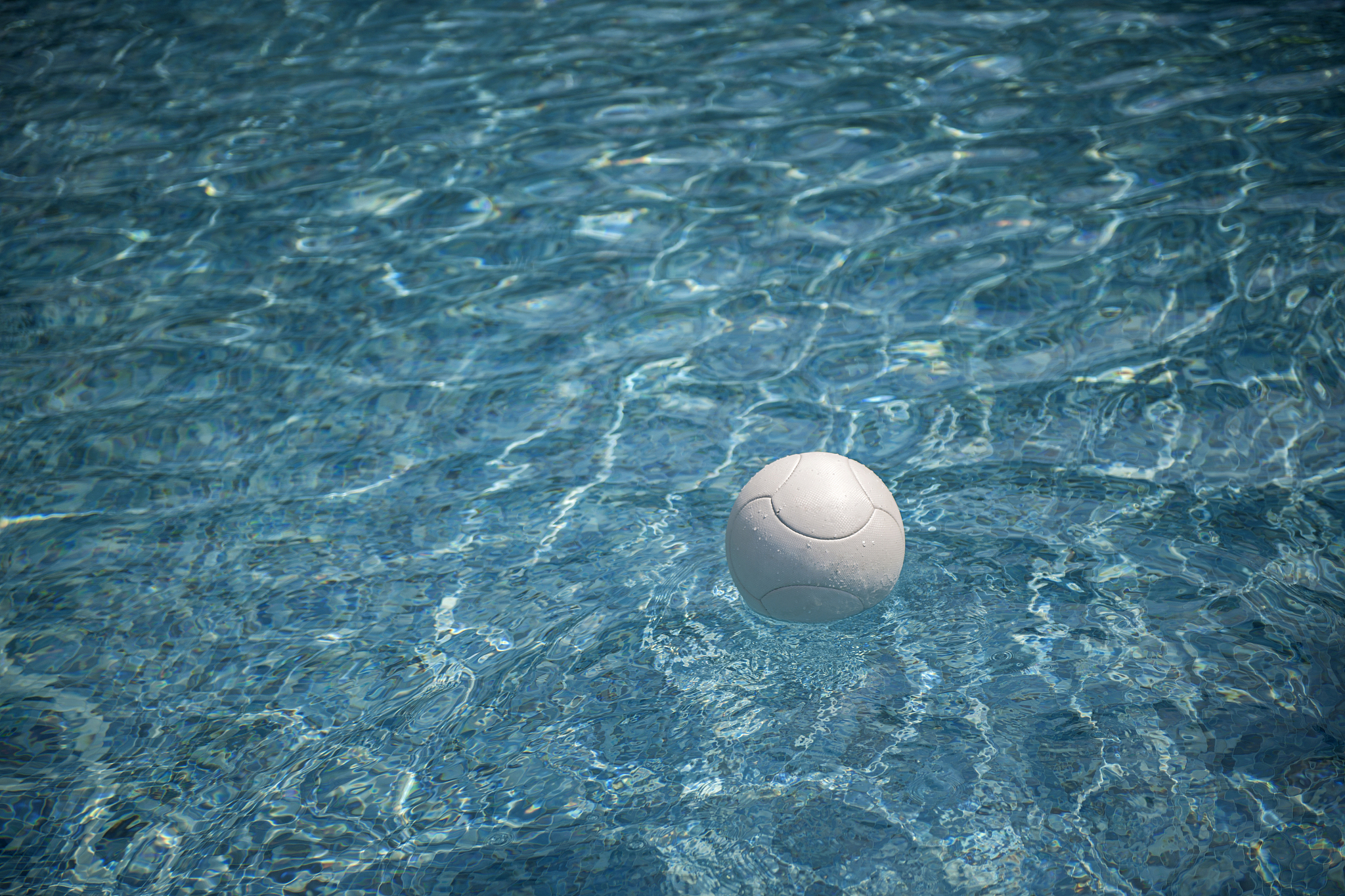 white ball in a swimming pool