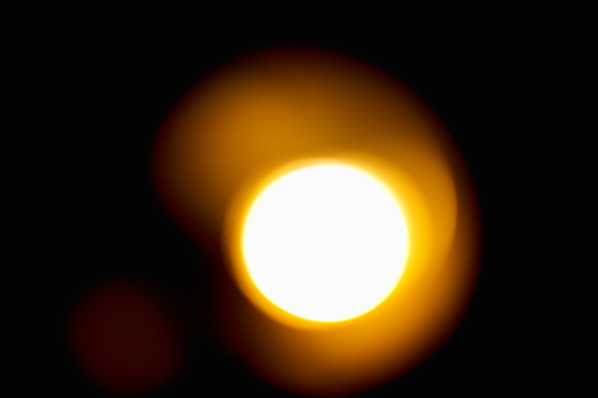 orange sun on black background