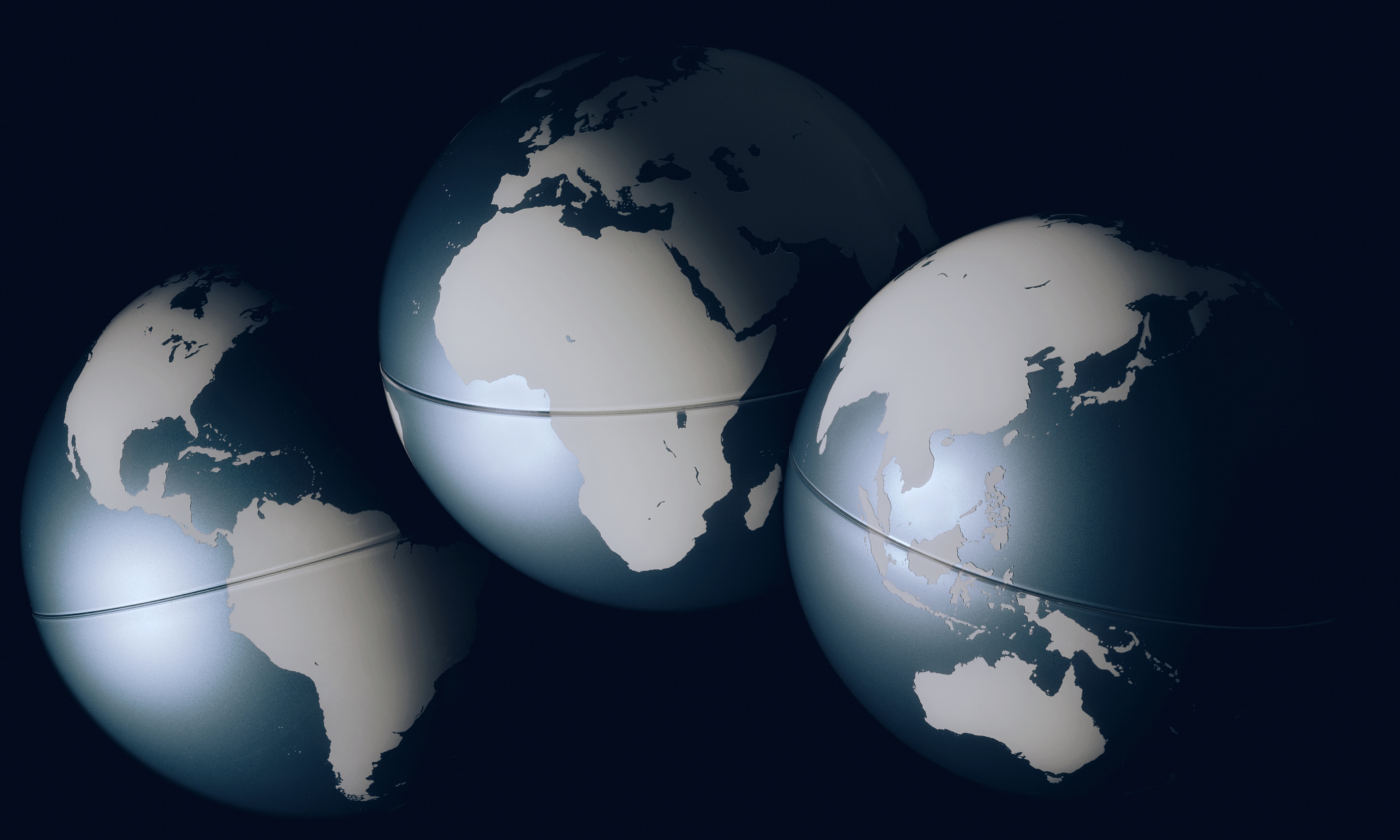 three world globes, close-up