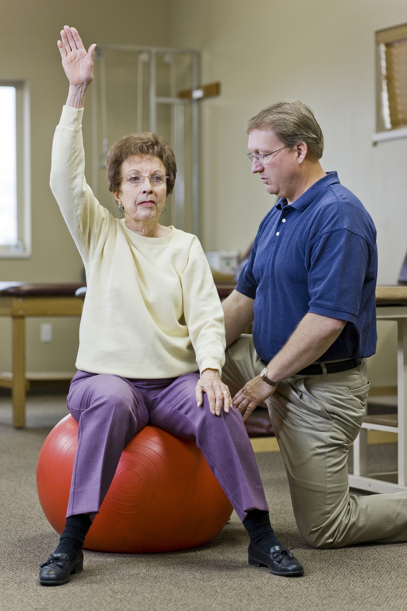 physical therapist working with a woman