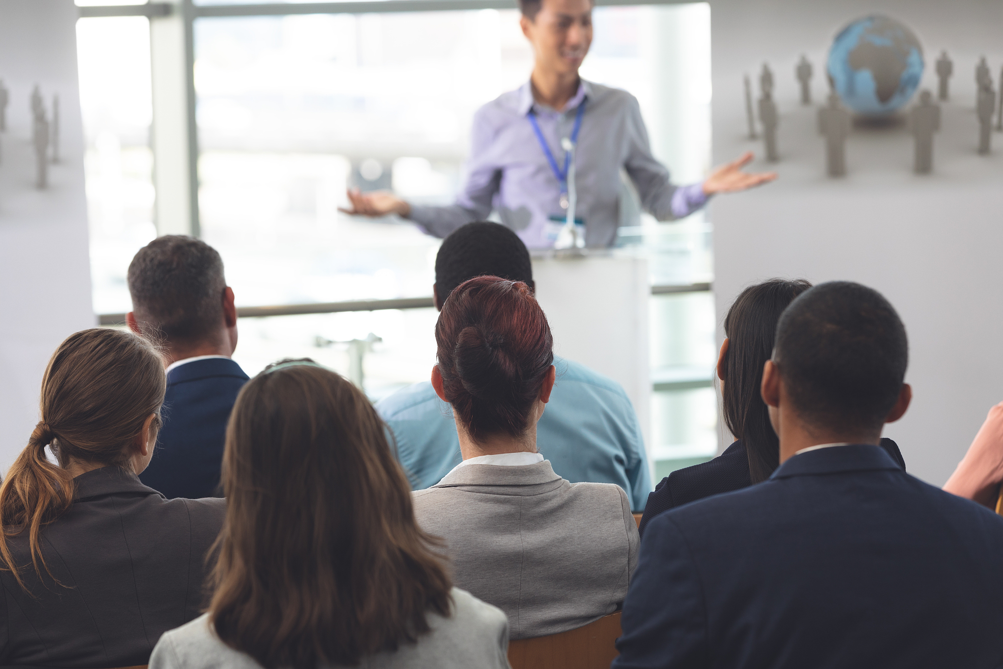 group of business professionals attending a seminar