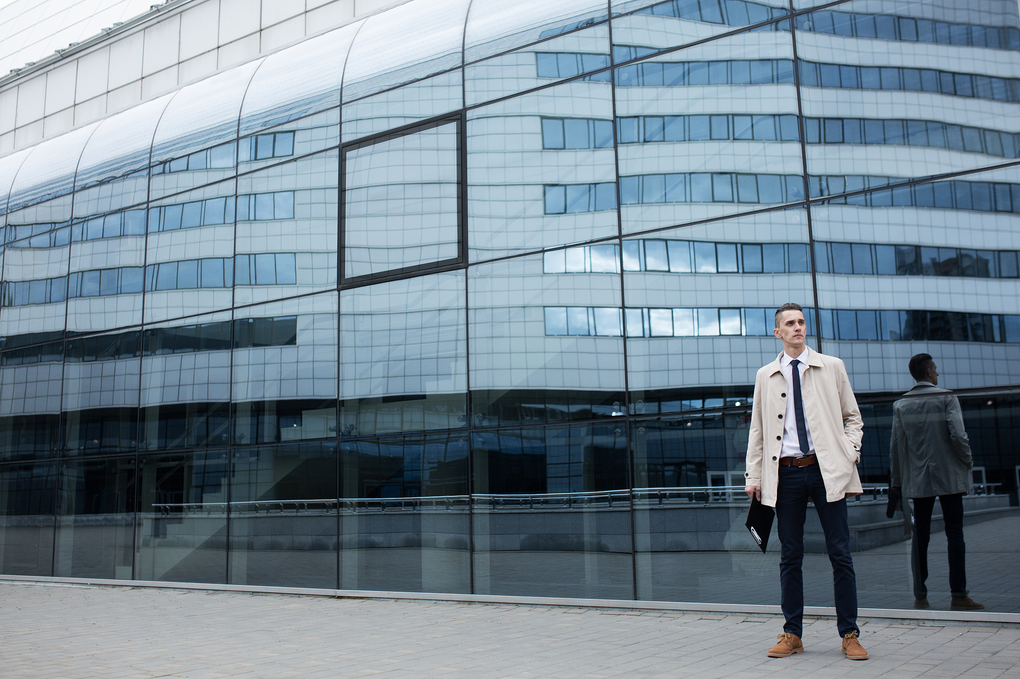 business portrait man near building
