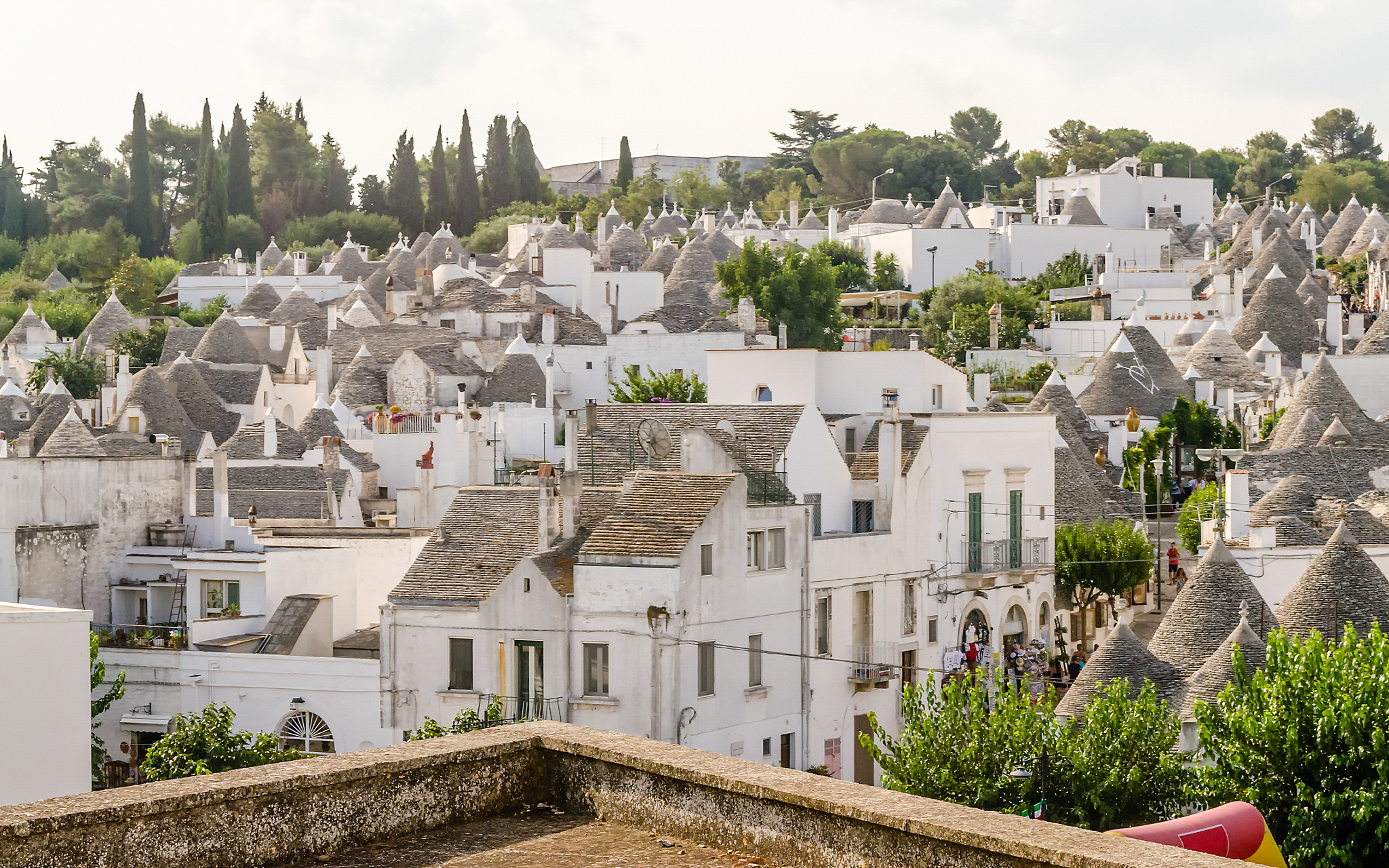 scenic panoramic view of alberobello and trulli buildings, apuli