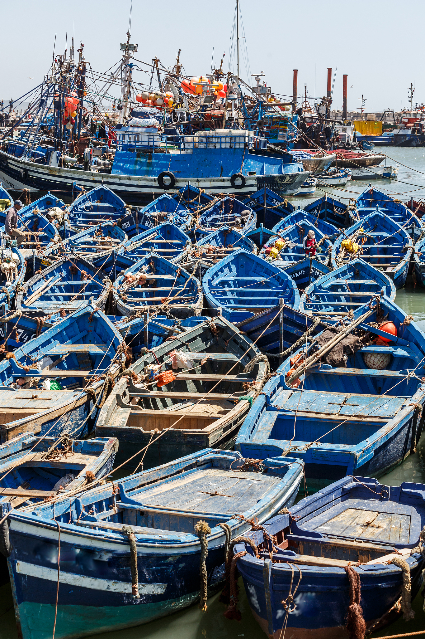 fishing boats moored at harbor
