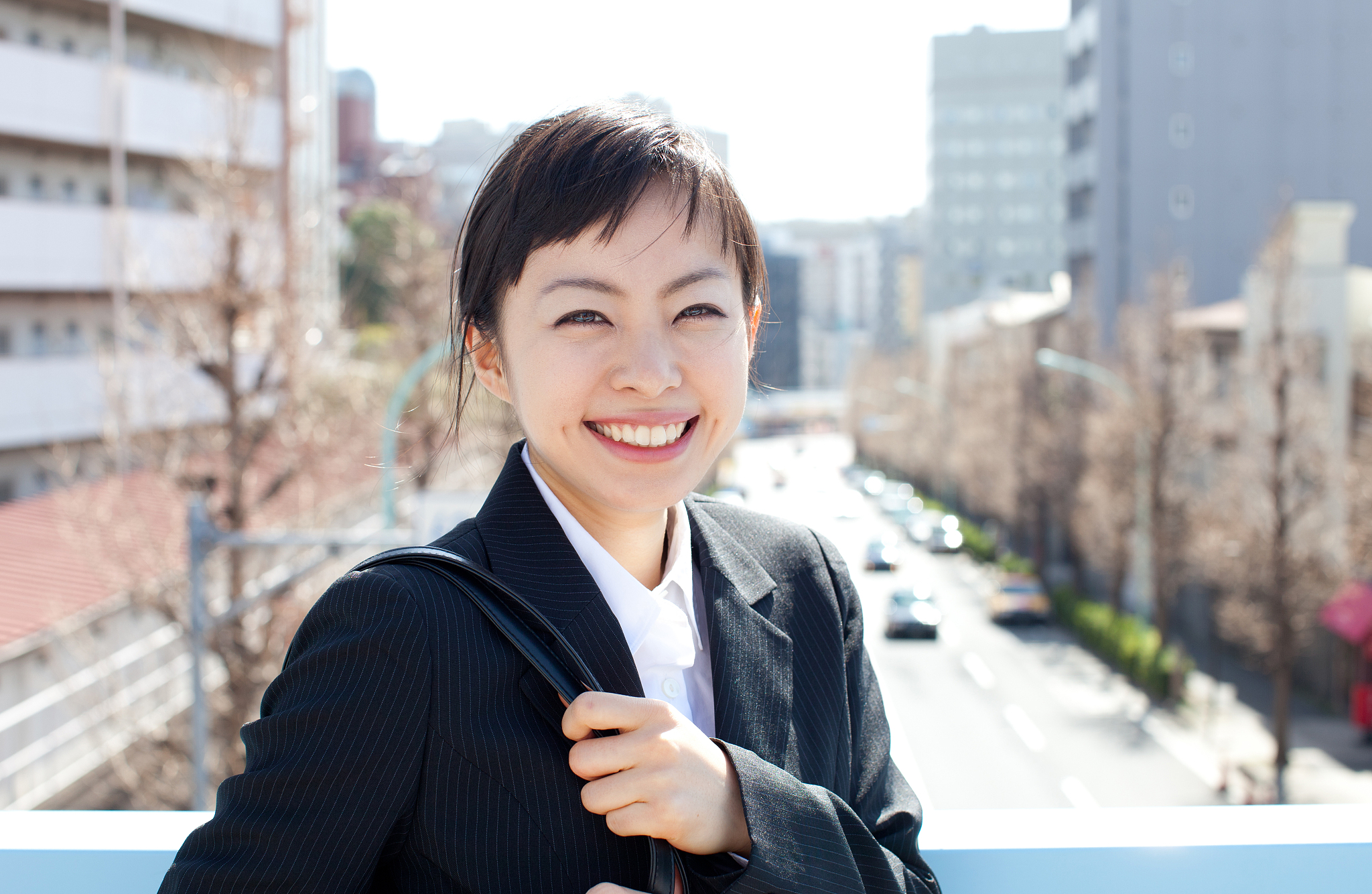 japanese businesswoman outside of office building