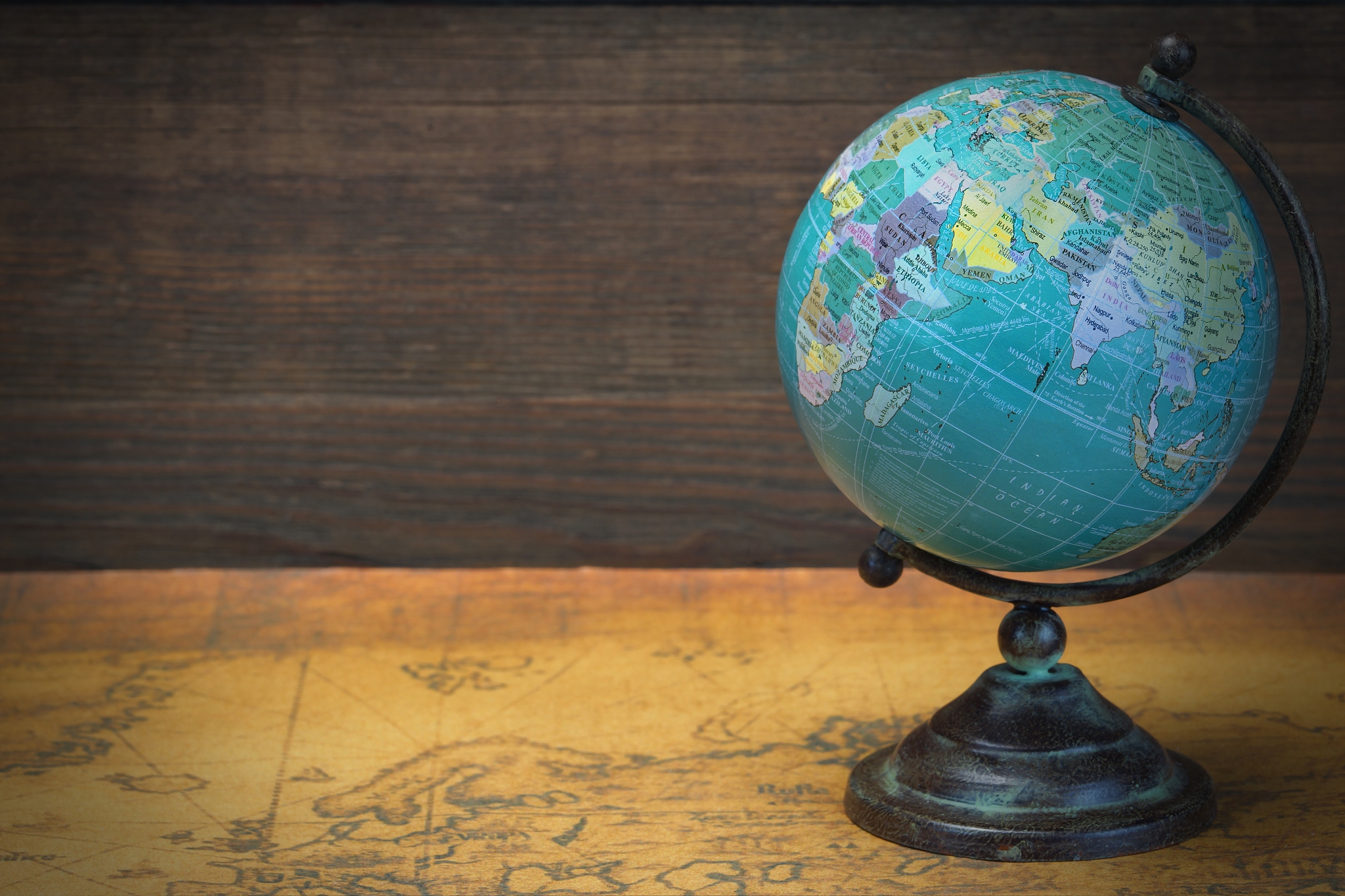 world globe on the old map