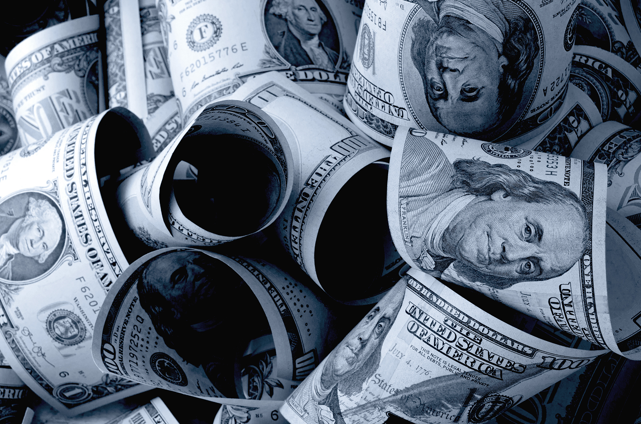 us dollars on a plane in black and white.