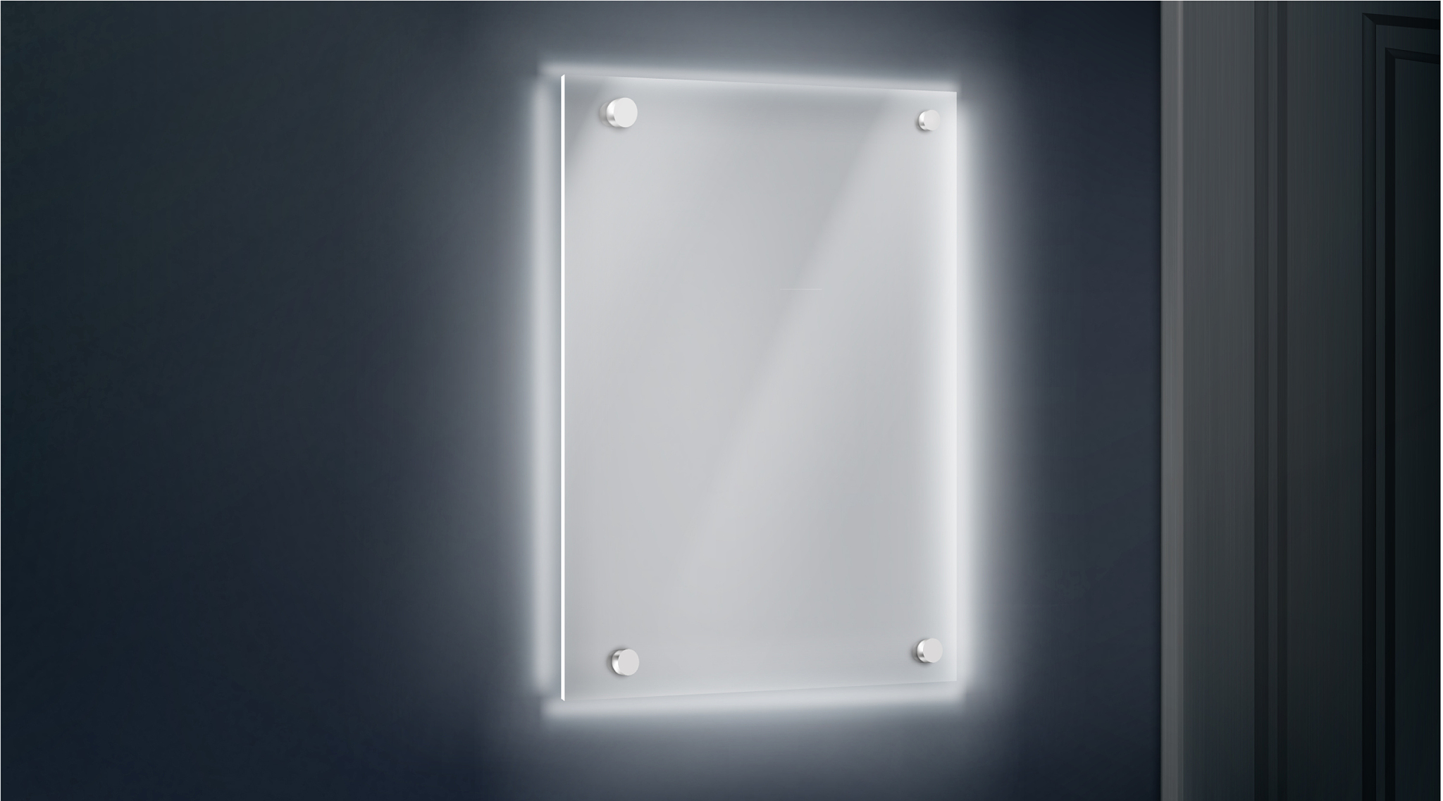 empty glass name plate bolted to wall near doorway