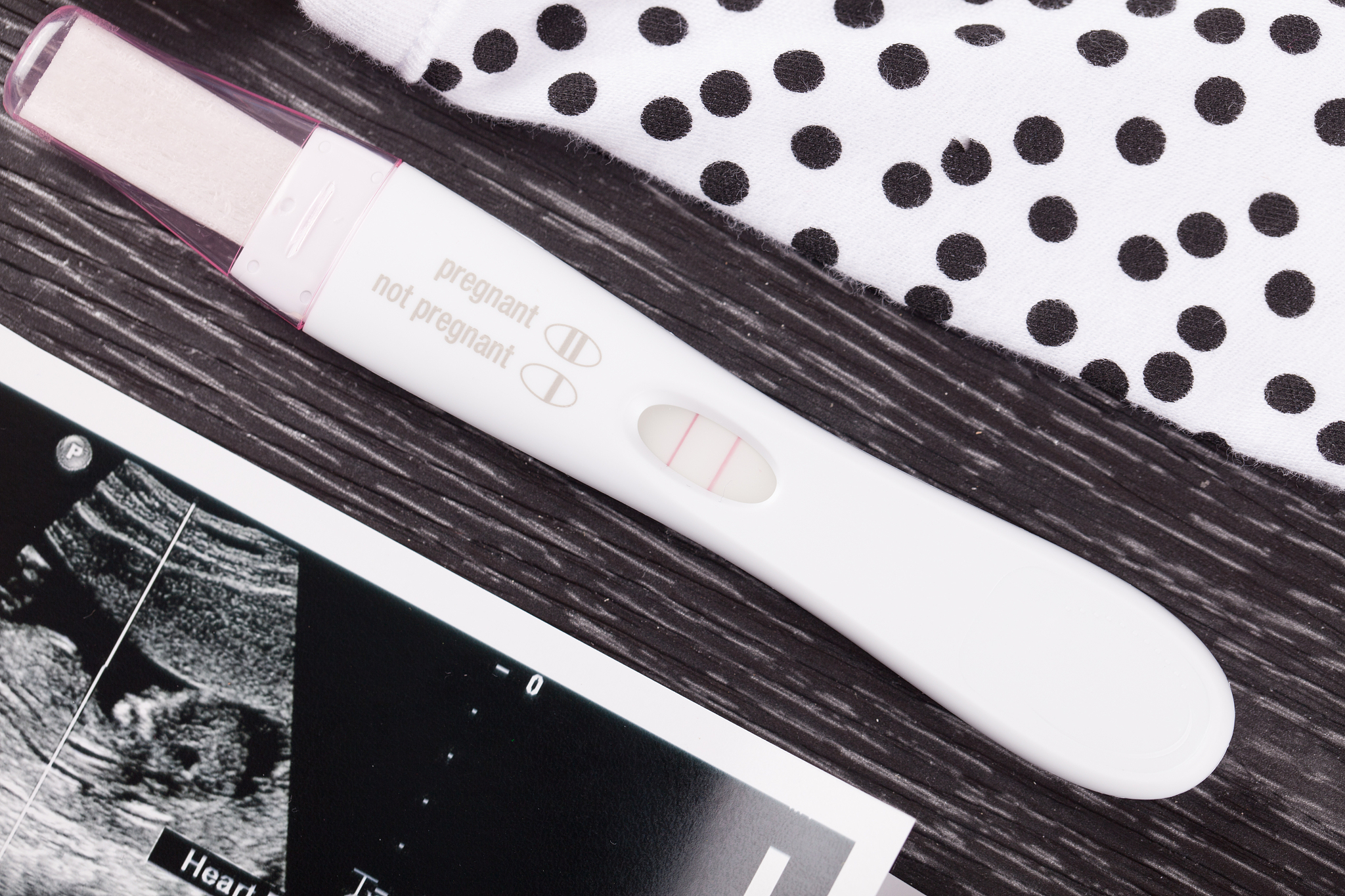 pregnancy test & ultrasound photo