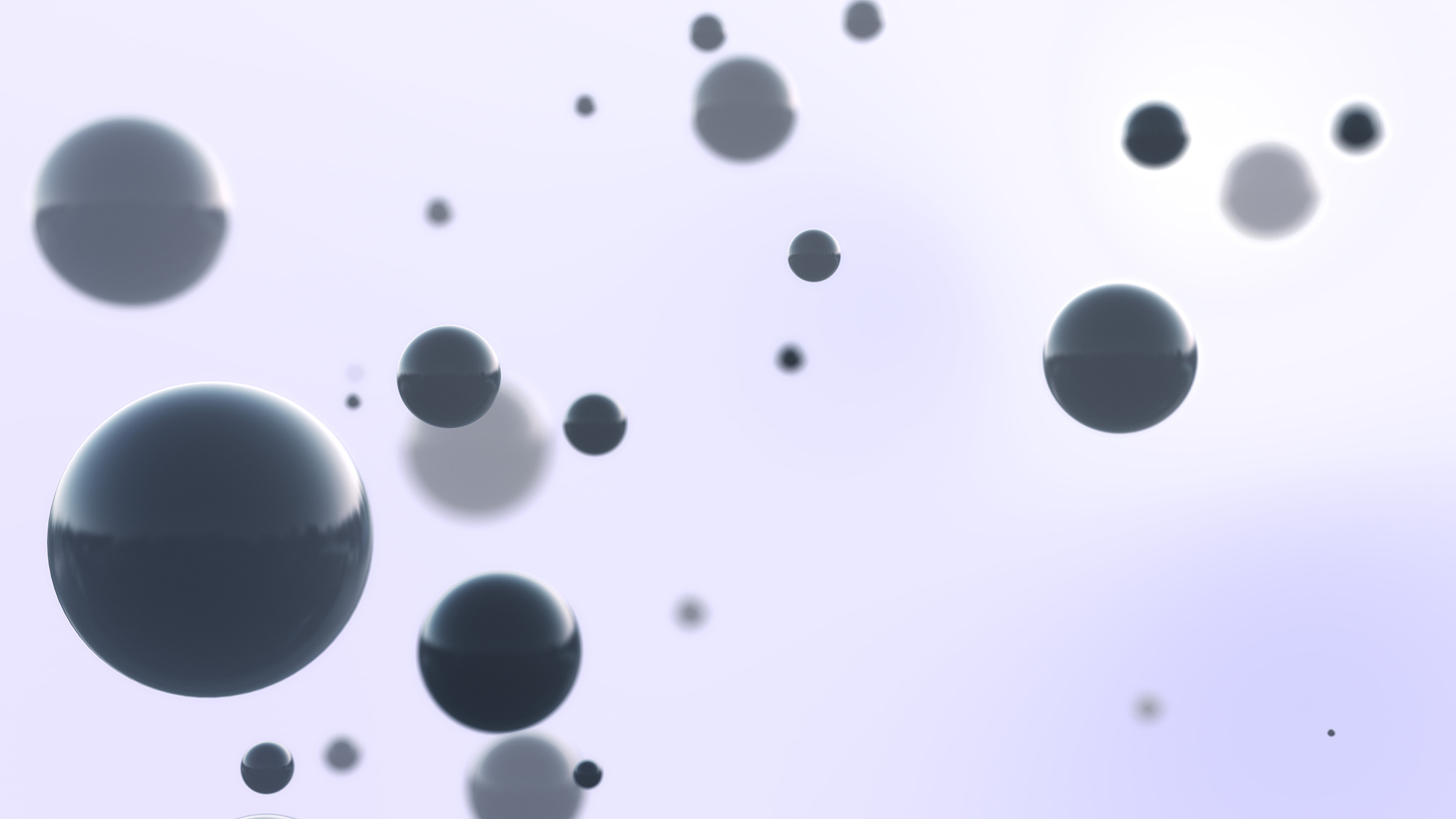 shiny black three dimensional spheres floating