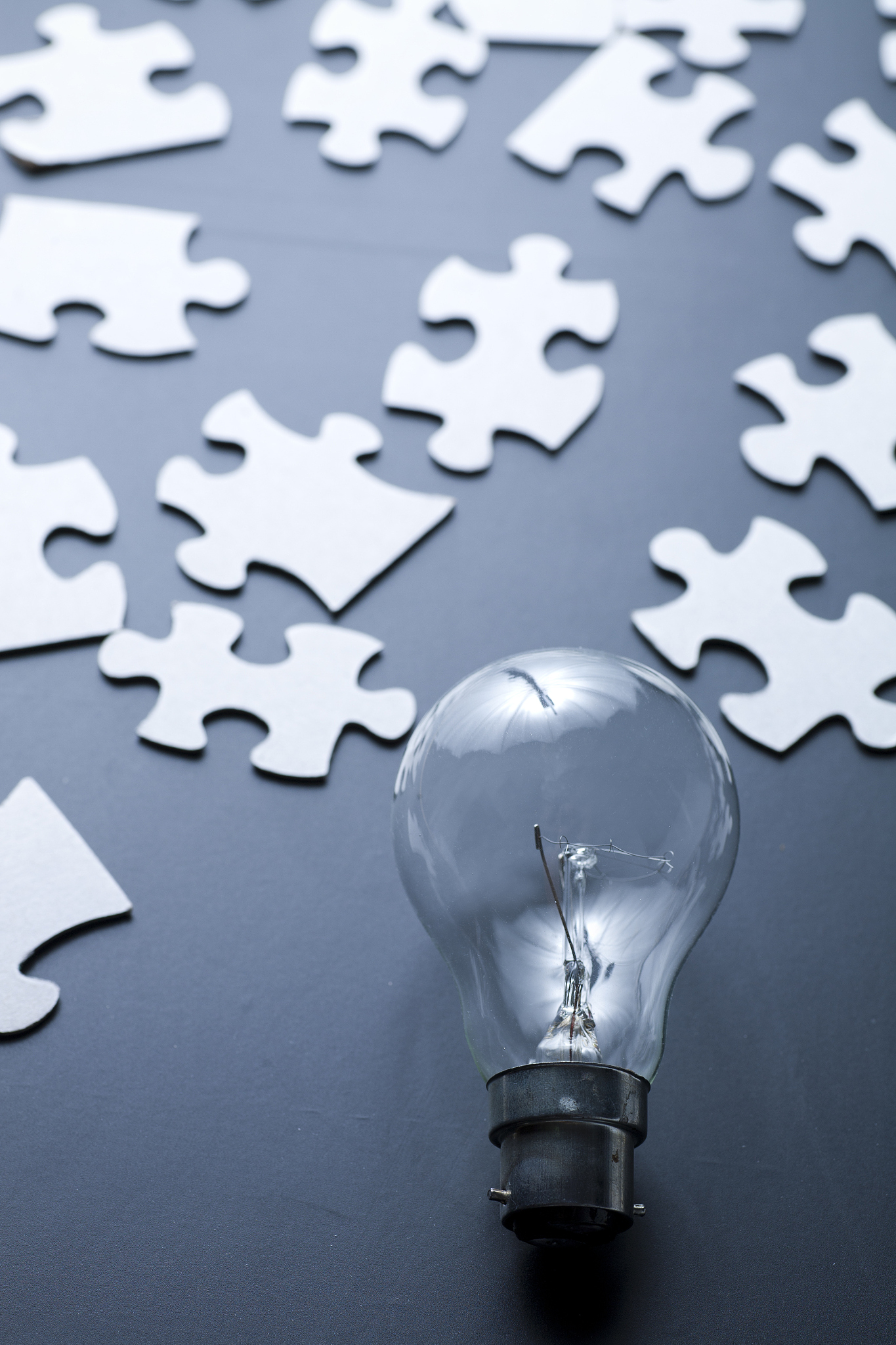 light bulb and puzzle pieces