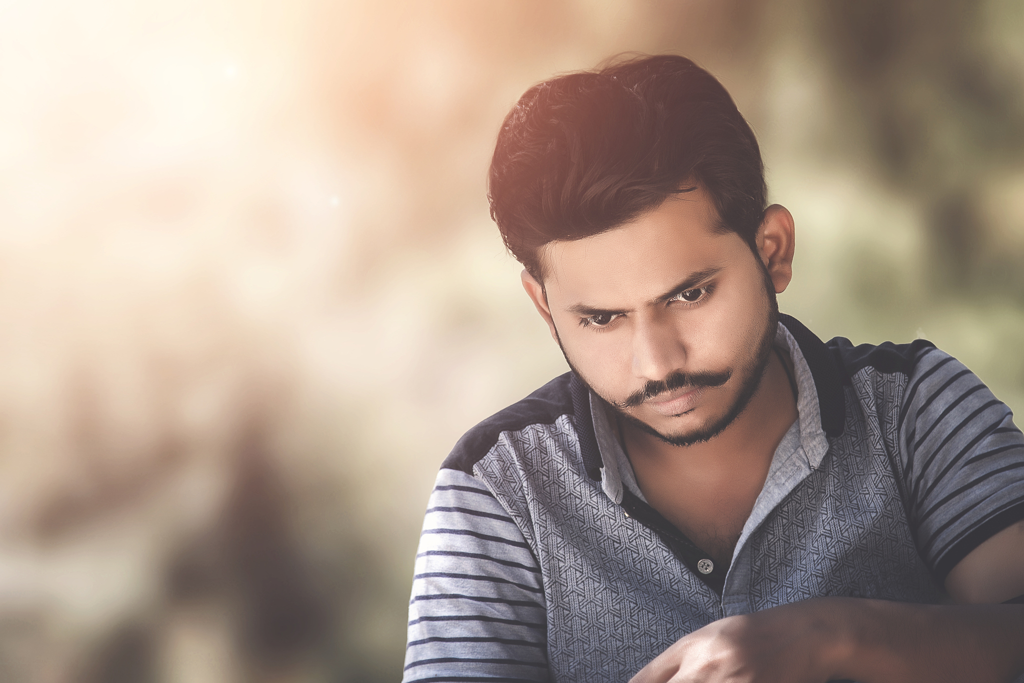 indian man thinking moody portrait