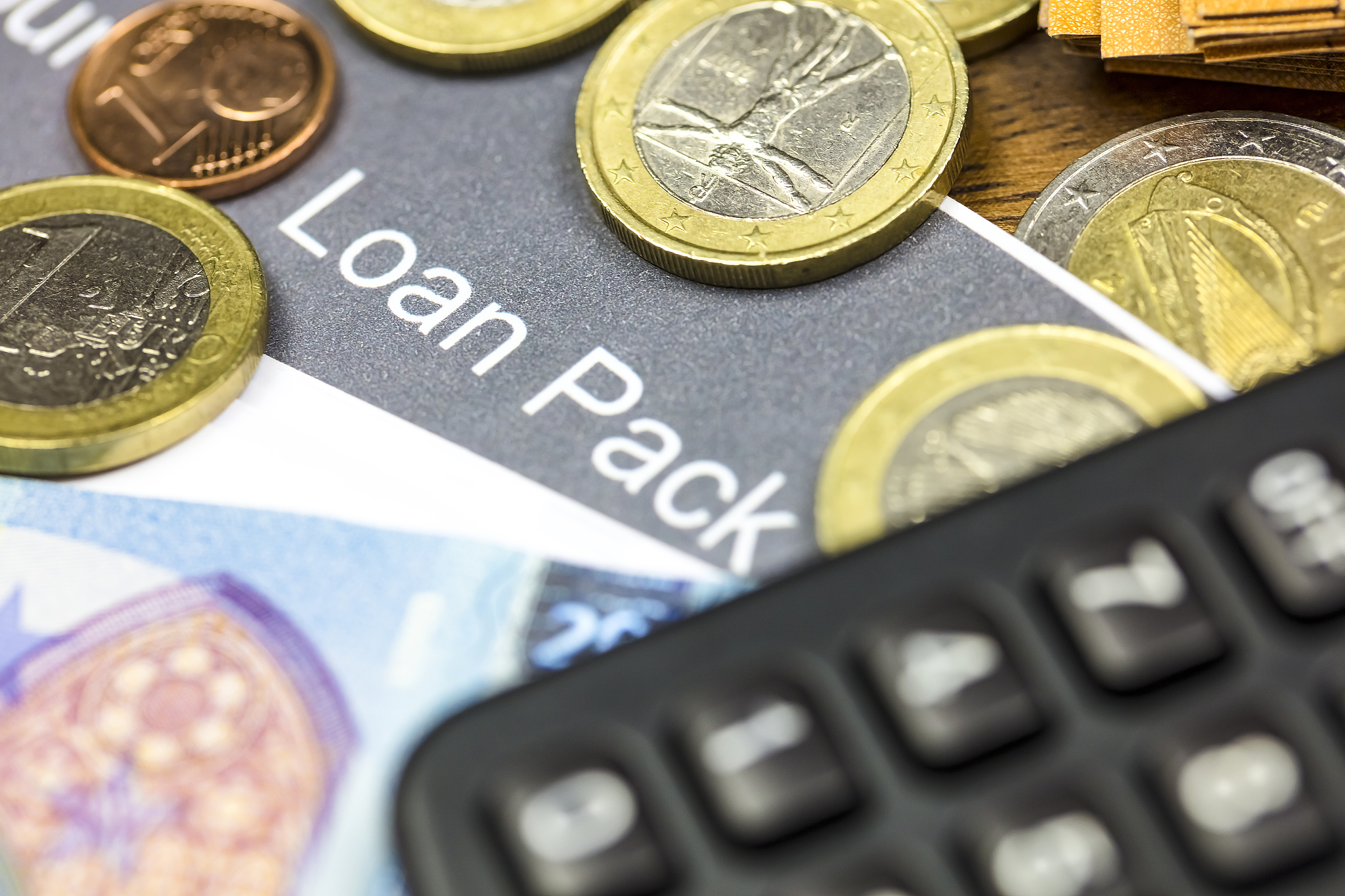 loan application, money and calculator