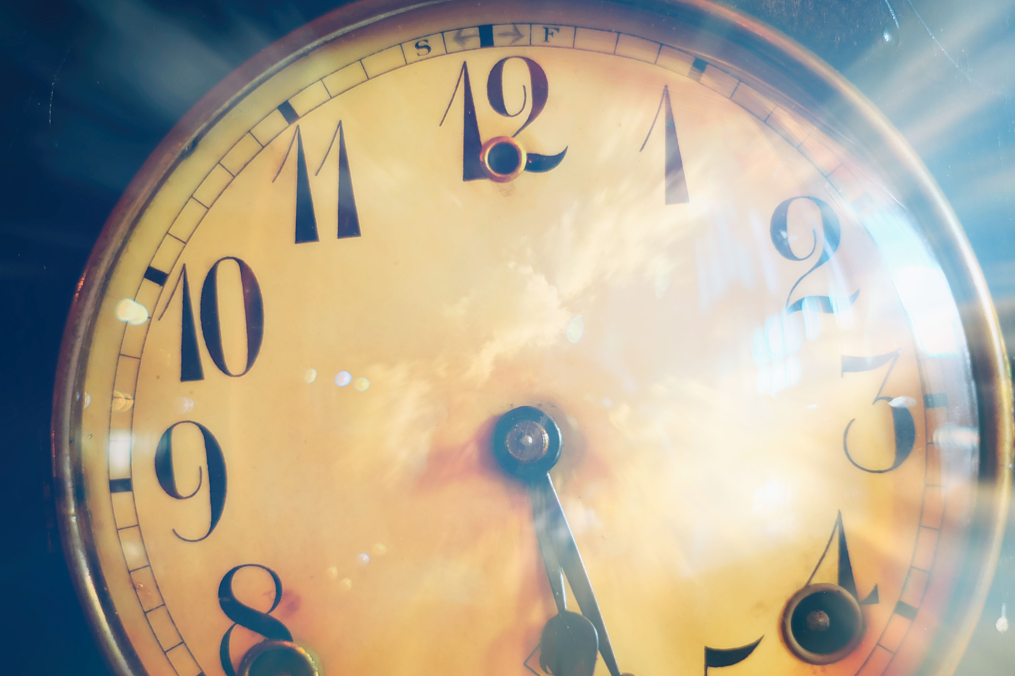vintage clock with cloud double exposure background.