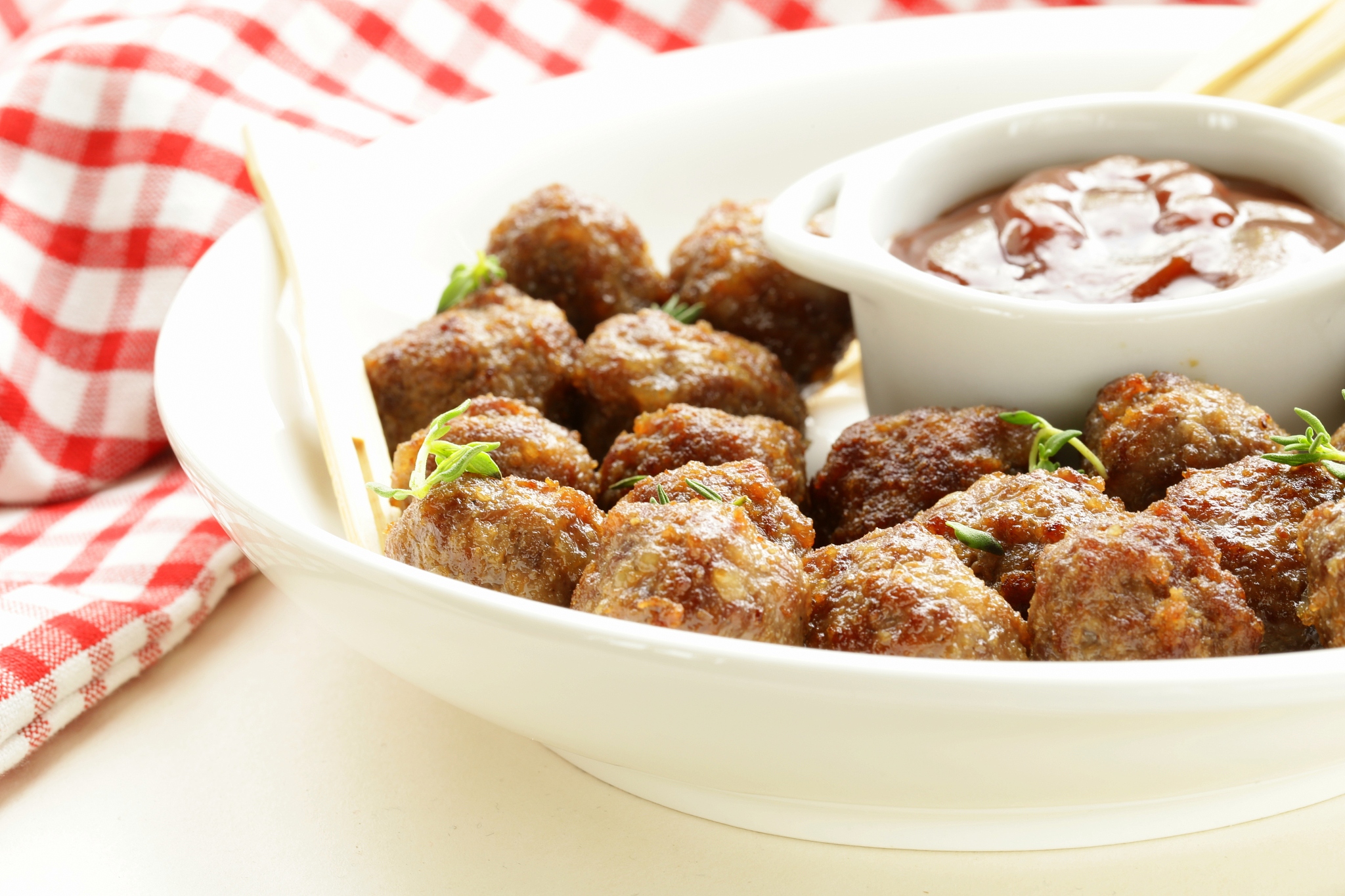 meatballs - traditional meat dish with sauce and herbs
