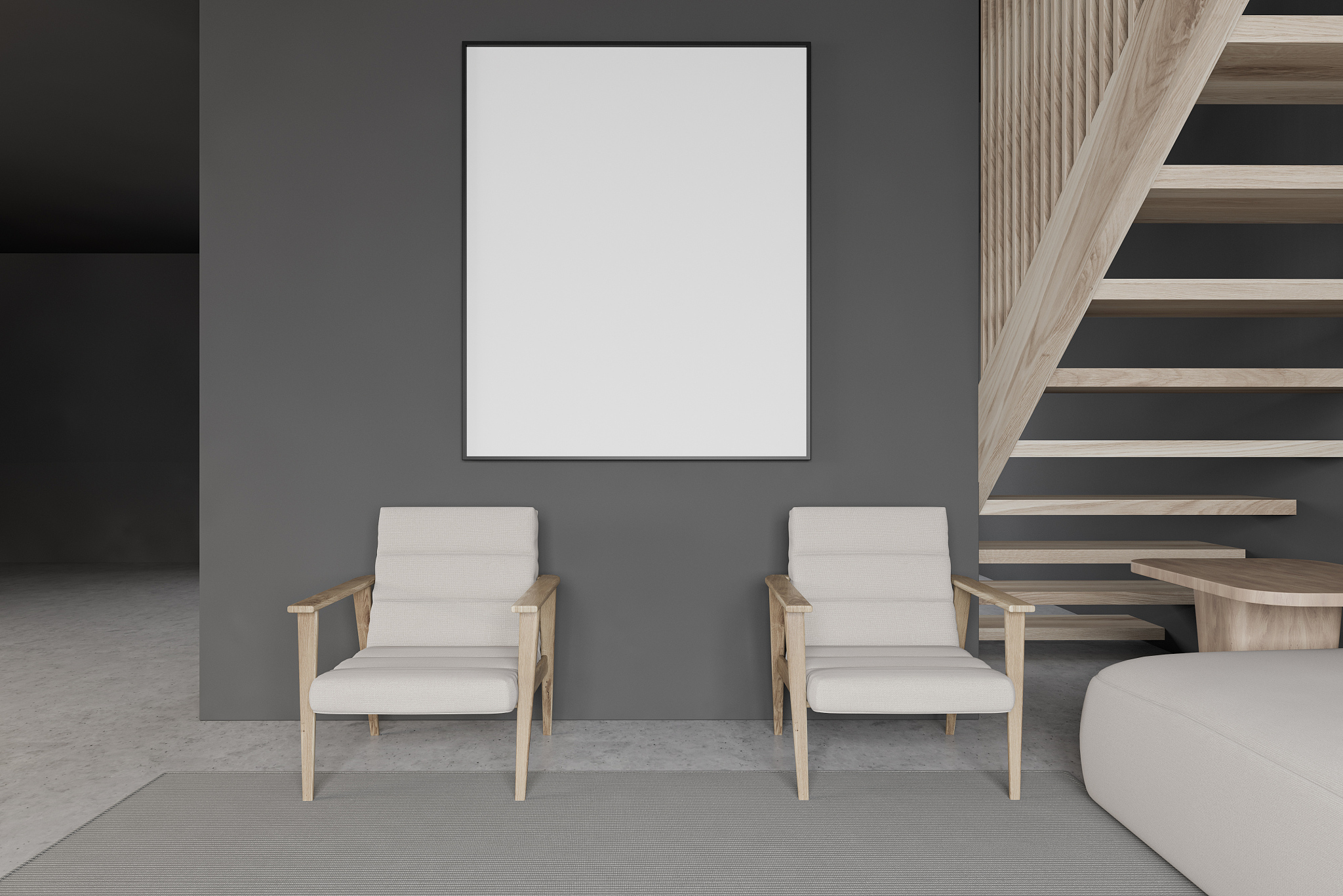 gray living room with two armchairs and poster