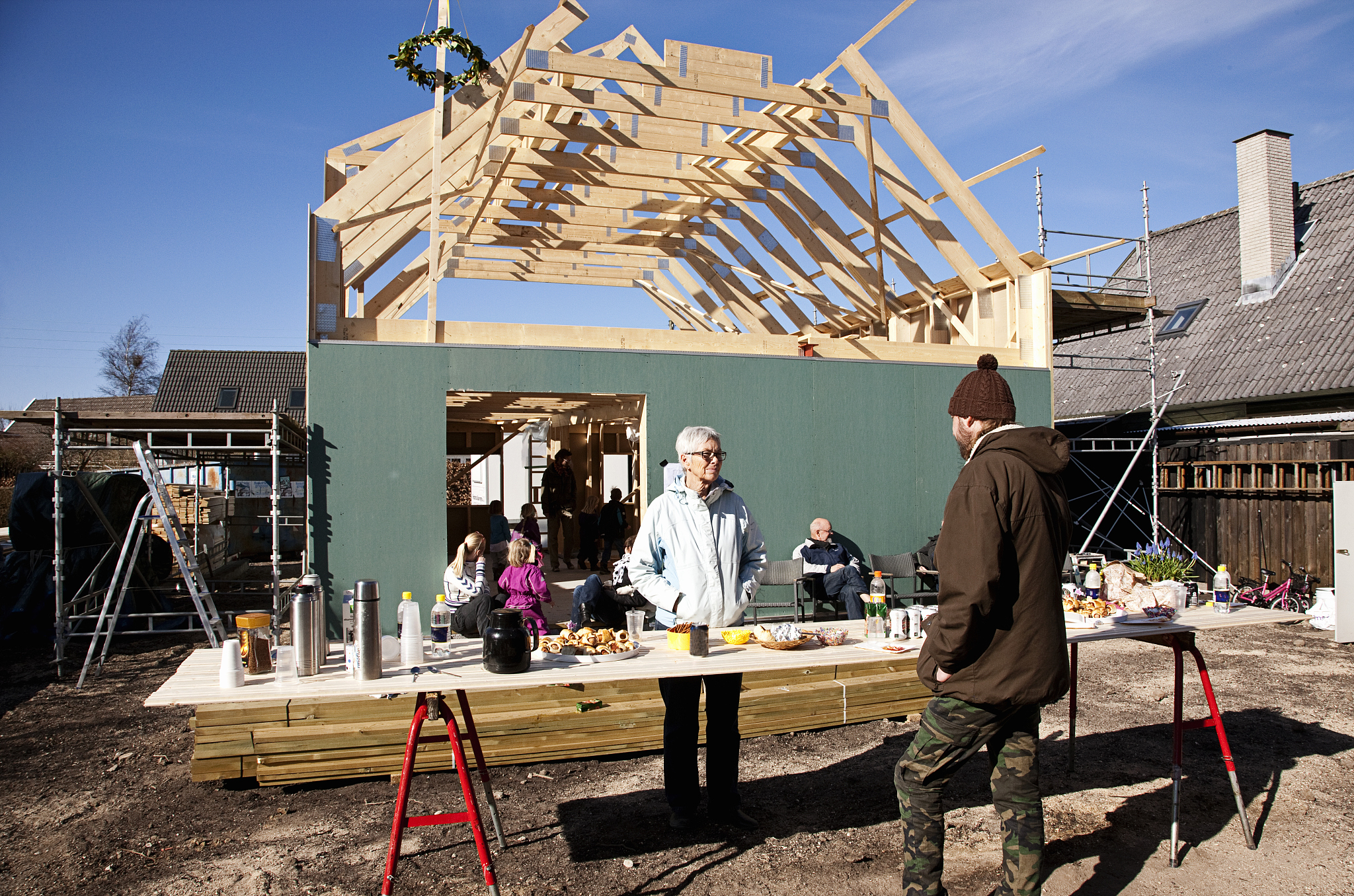 builders talking on construction site