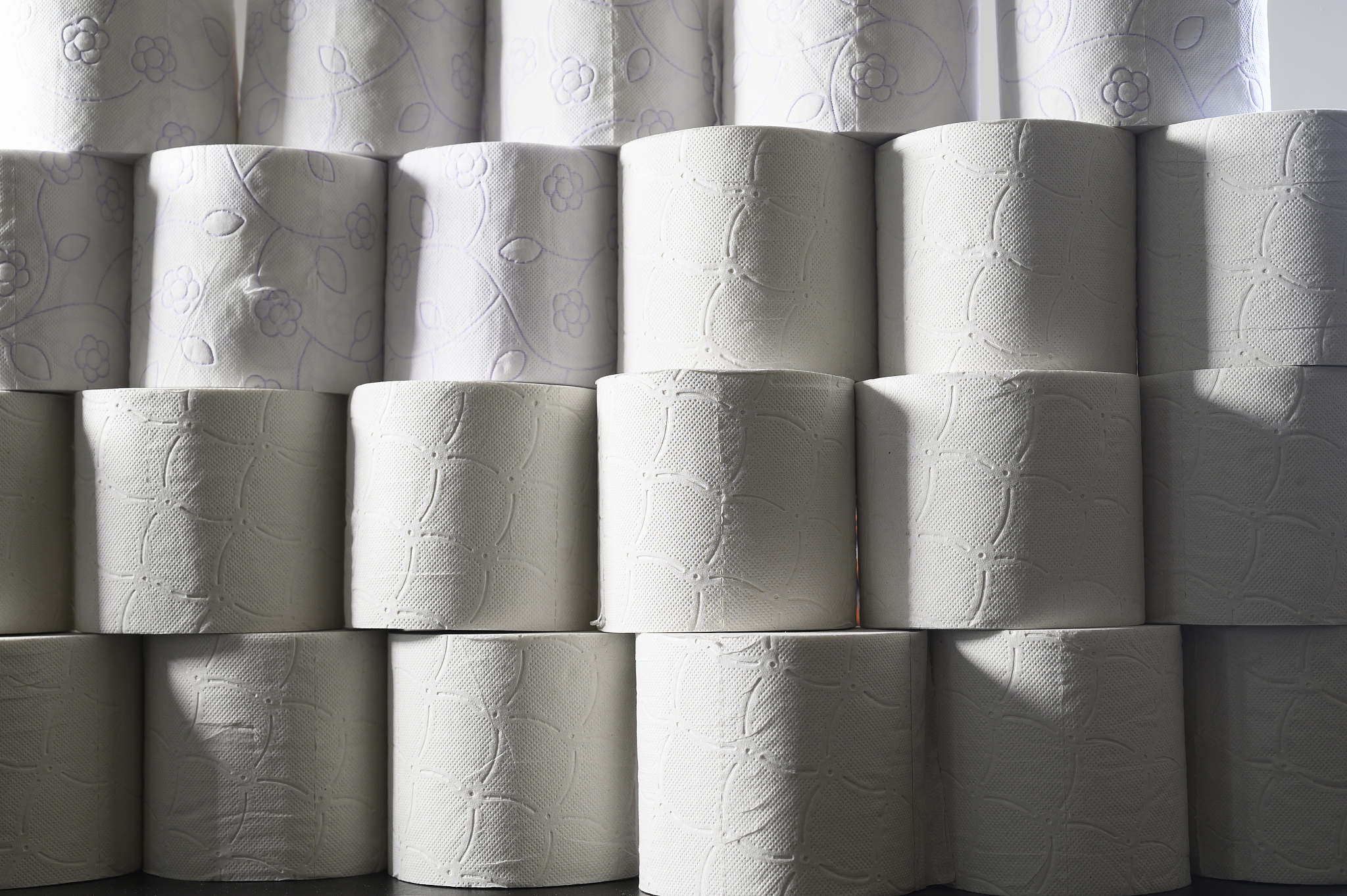 large number of rolls of paper. storage concept.