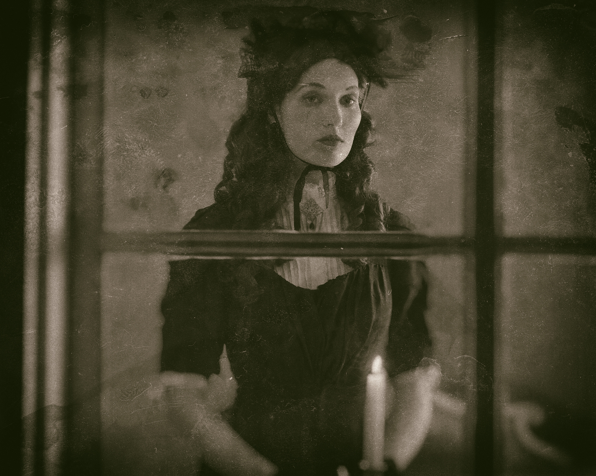 worn wet plate photo of victorian woman in black dress standing 