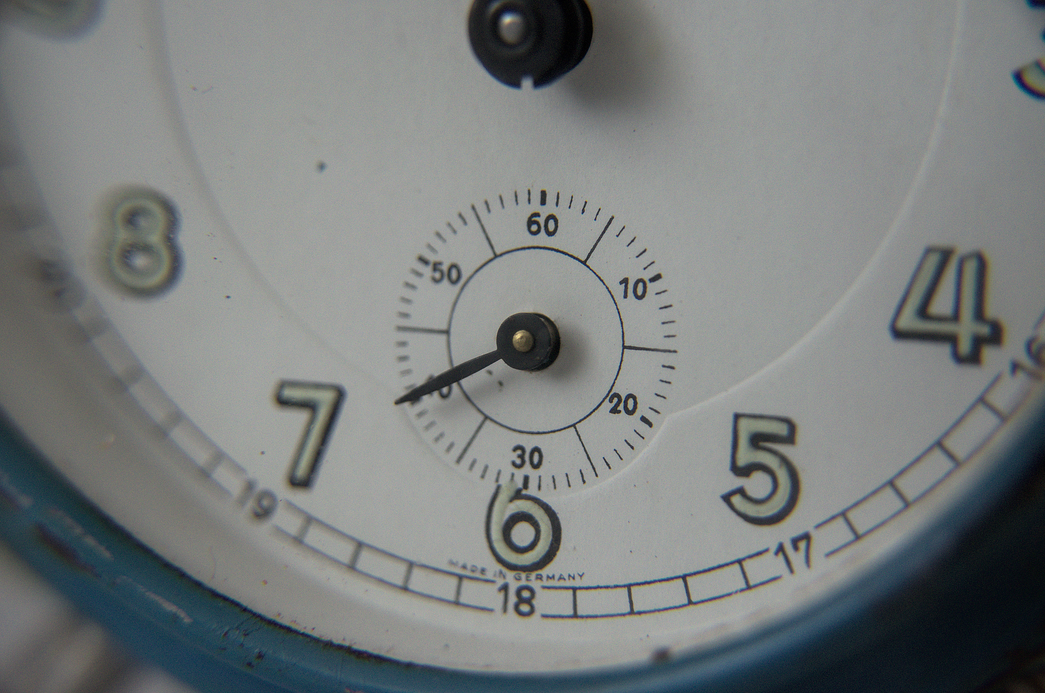 close up vintage alarm clock blue