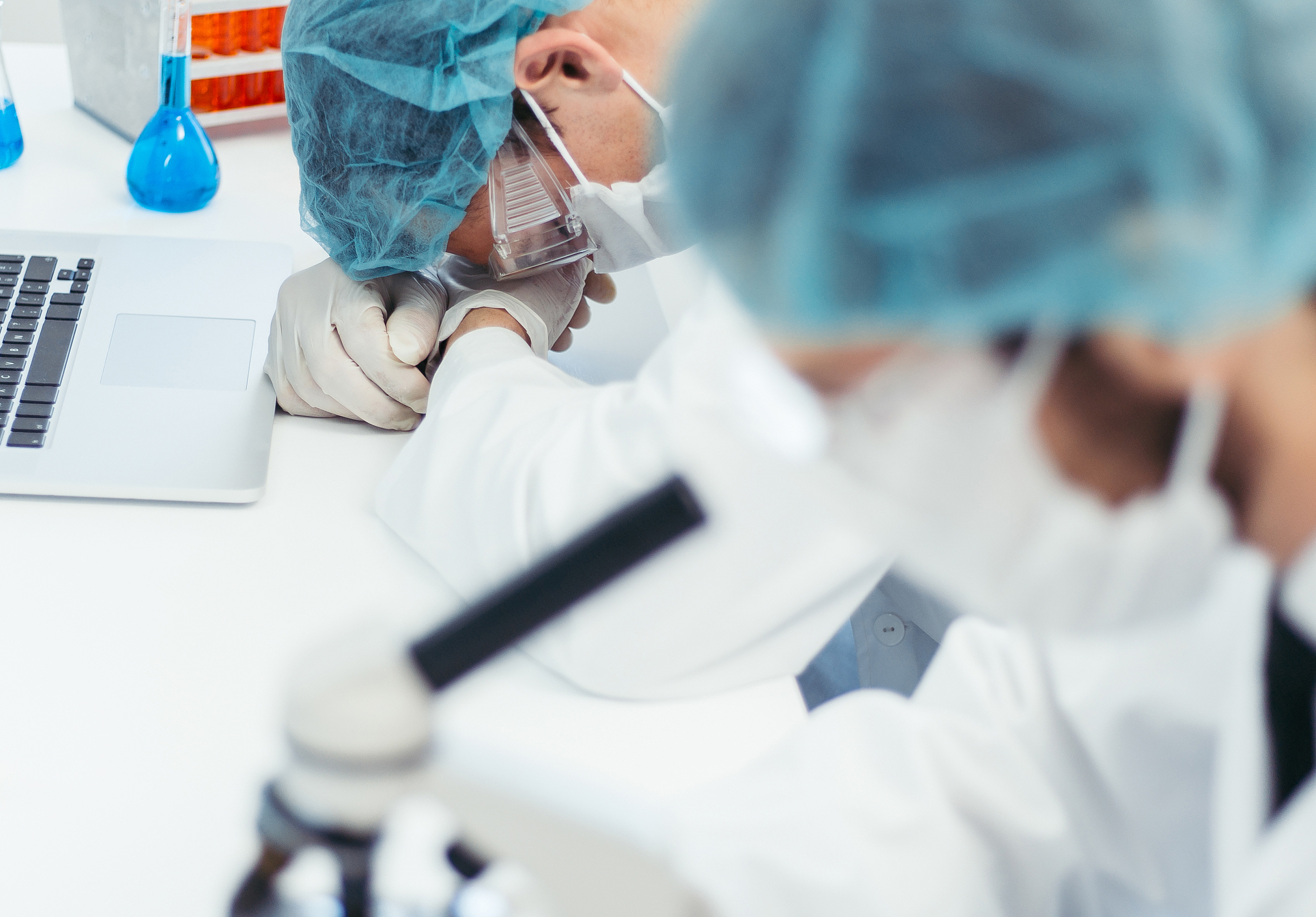 close up. tired scientist sleeps on his desk in the laboratory